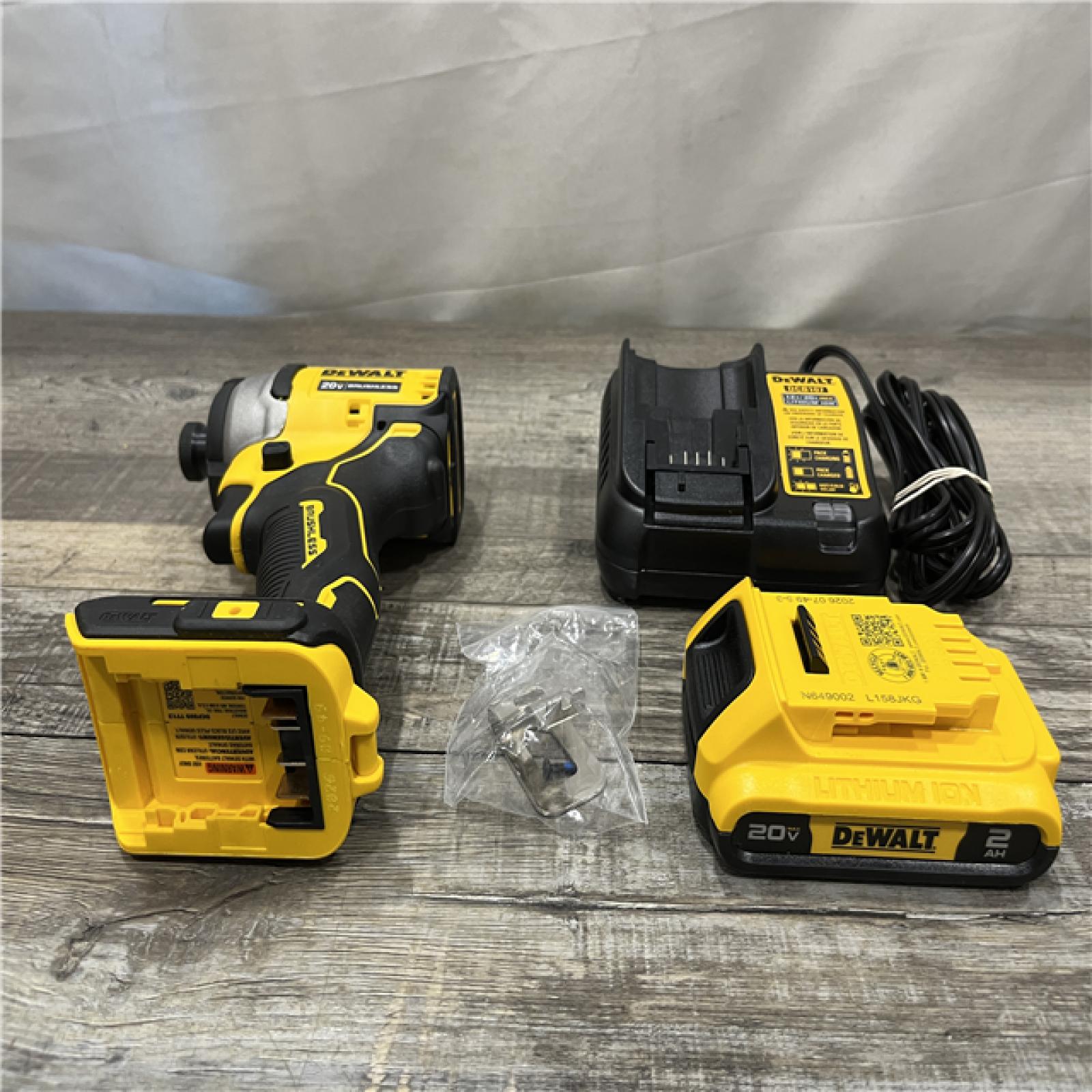 AS-IS DEWALT Atomic 20V Max Lithium-Ion Brushless Cordless Compact 1/4 in. Impact Driver Kit