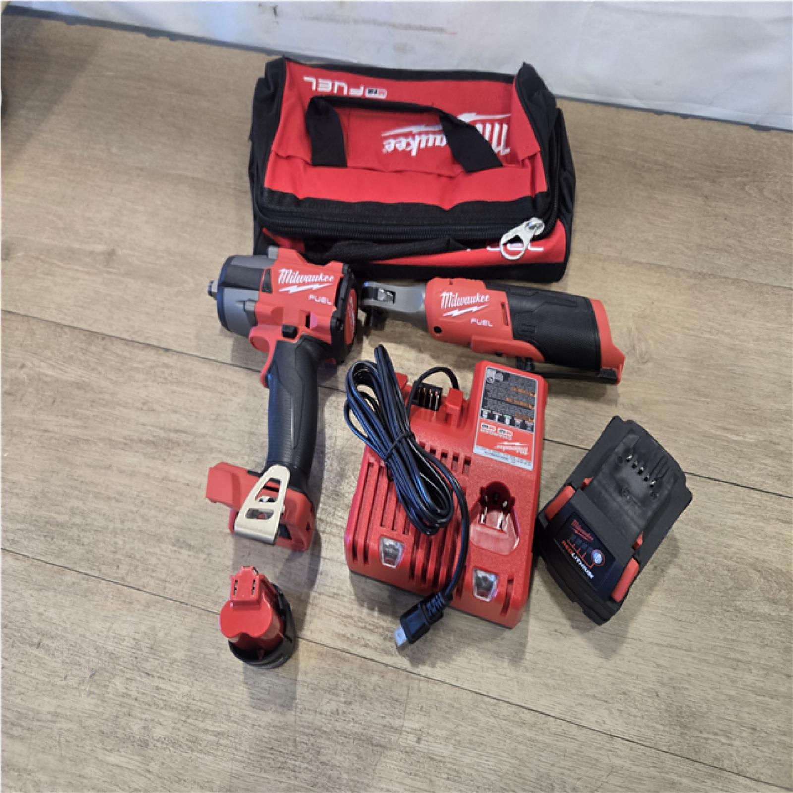 AS-IS - Milwaukee FUEL 18V Cordless Mid Torque 1/2 in. Impact Wrench w/ 12 FUEL 3/8 in. Ratchet Combo Kit