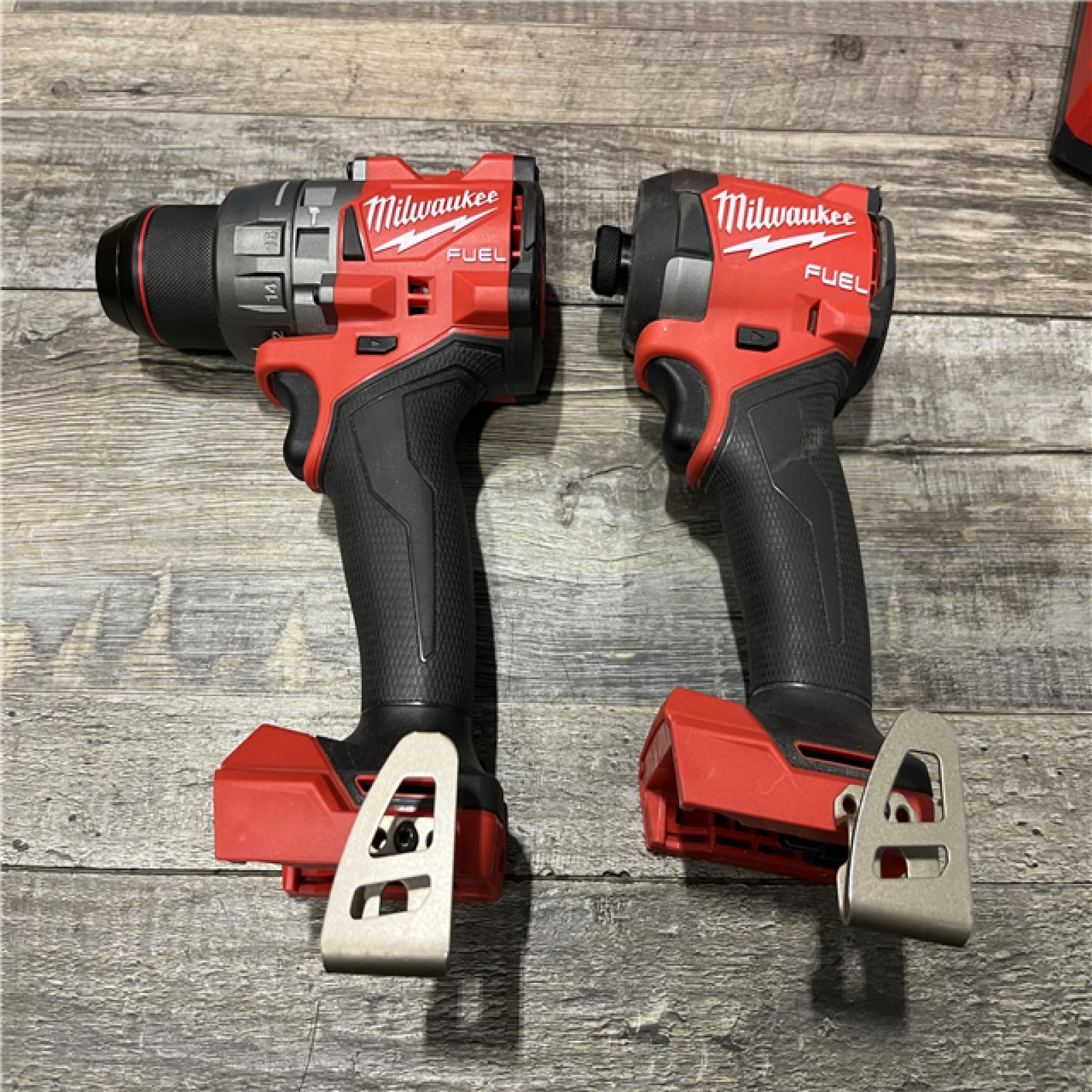 AS-IS Milwaukee FUEL 18V Lithium-Ion Brushless Cordless Hammer Drill and Impact Driver Combo Kit
