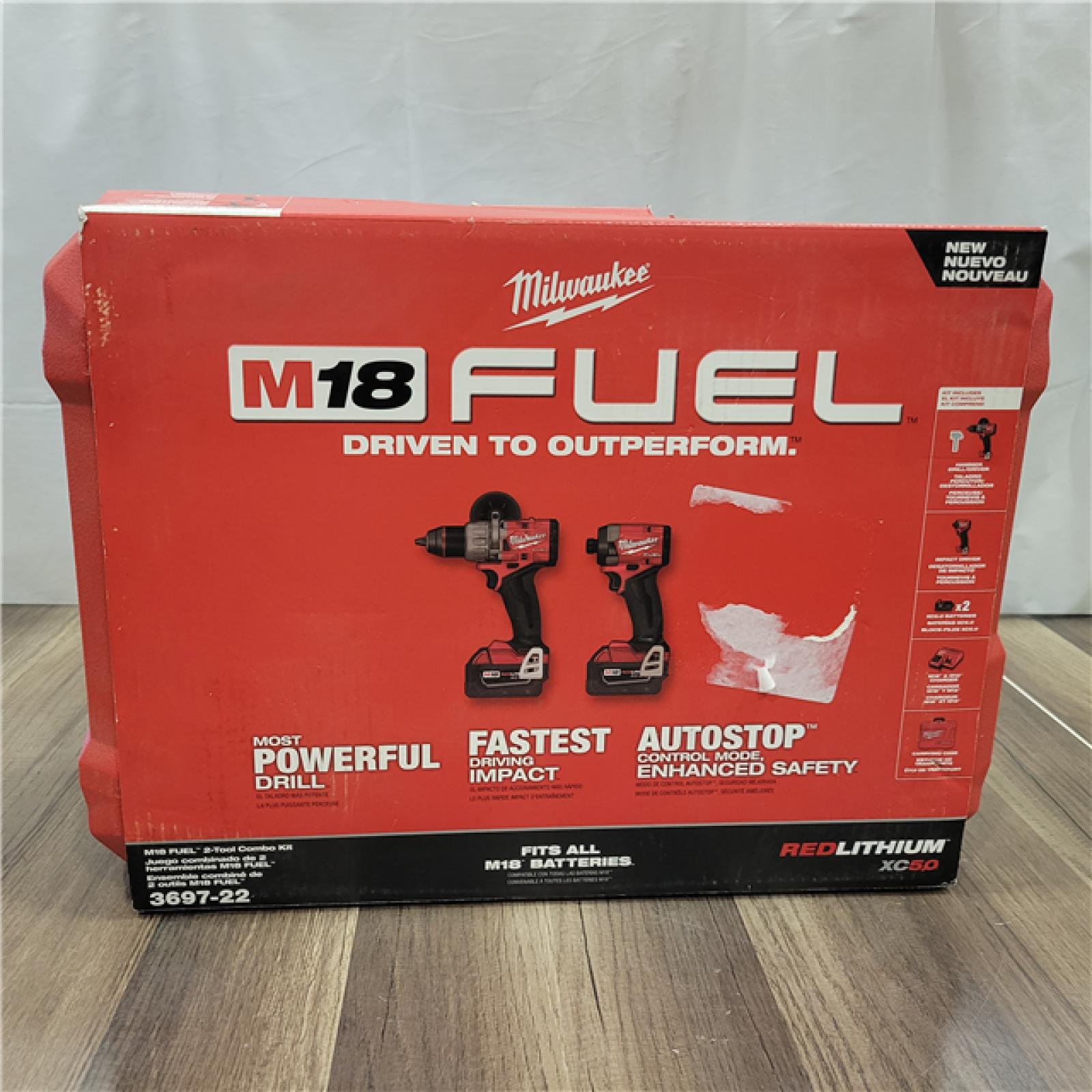 AS-IS  Milwaukee M18 FUEL 18V Lithium-Ion Brushless Cordless Hammer Drill and Impact Driver Combo Kit (2-Tool) with 2 Batteries