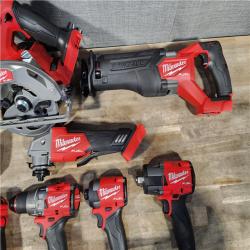 HOUSTON LOCATION - AS-IS (APPEARS LIKE NEW) Milwaukee M18 FUEL 18V Lithium-Ion Brushless Cordless Combo Kit with Two 5.0 Ah Batteries  1 Charger  2 Tool Bags (7-Tool)