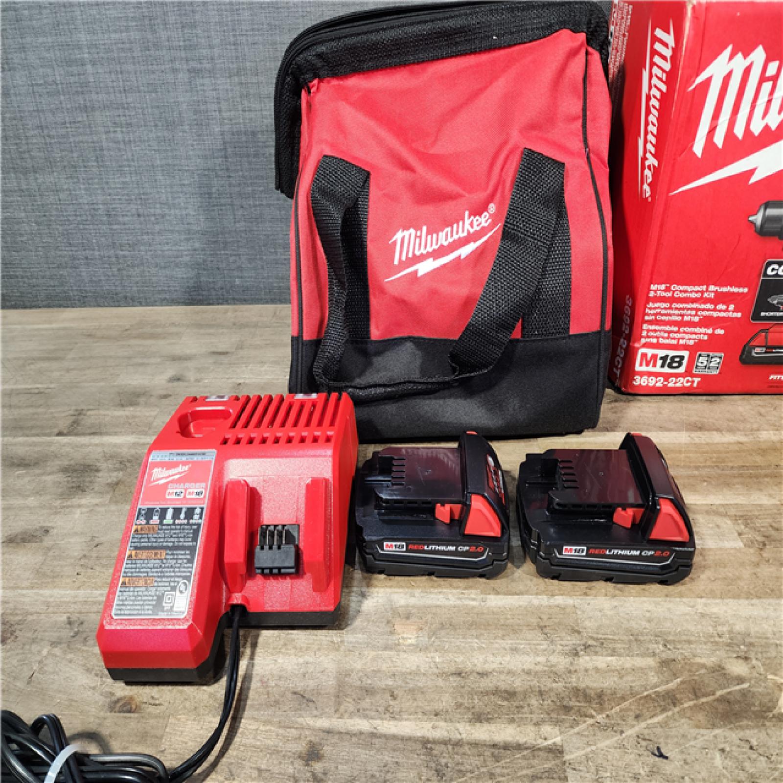 HOUSTON LOCATION - AS-IS Milwaukee M18 18V Lithium-Ion Brushless Cordless Compact Drill/Impact Combo Kit (2-Tool) W/(2) 2.0 Ah Batteries  Charger & Bag