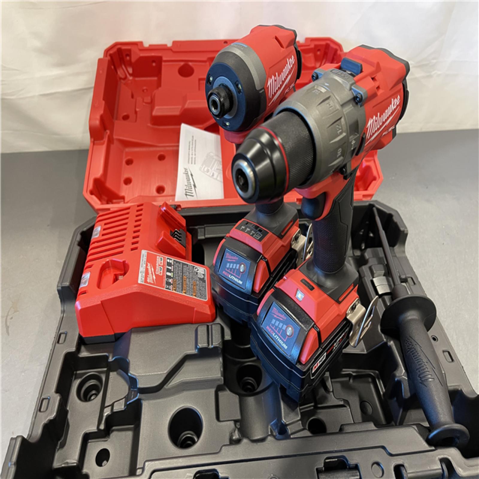 AS-IS - MILWAUKEE M18 FUEL 18V Lithium-Ion Brushless Cordless Hammer Drill and Impact Driver Combo Kit