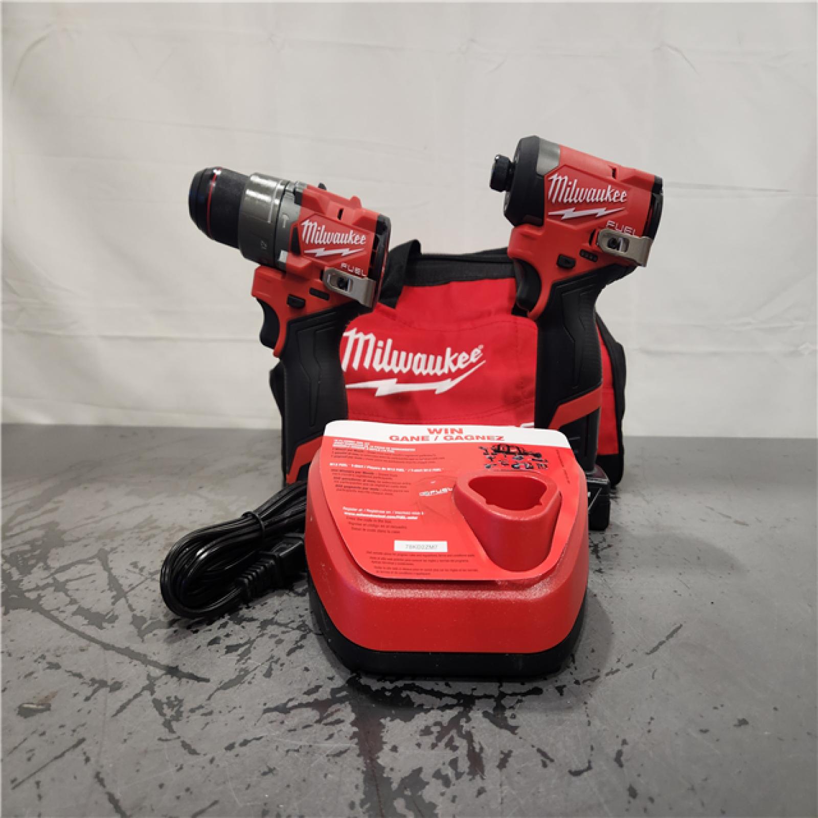 AS-IS- Milwaukee FUEL 12-Volt Lithium-Ion Brushless Cordless Hammer Drill and Impact Driver Combo Kit