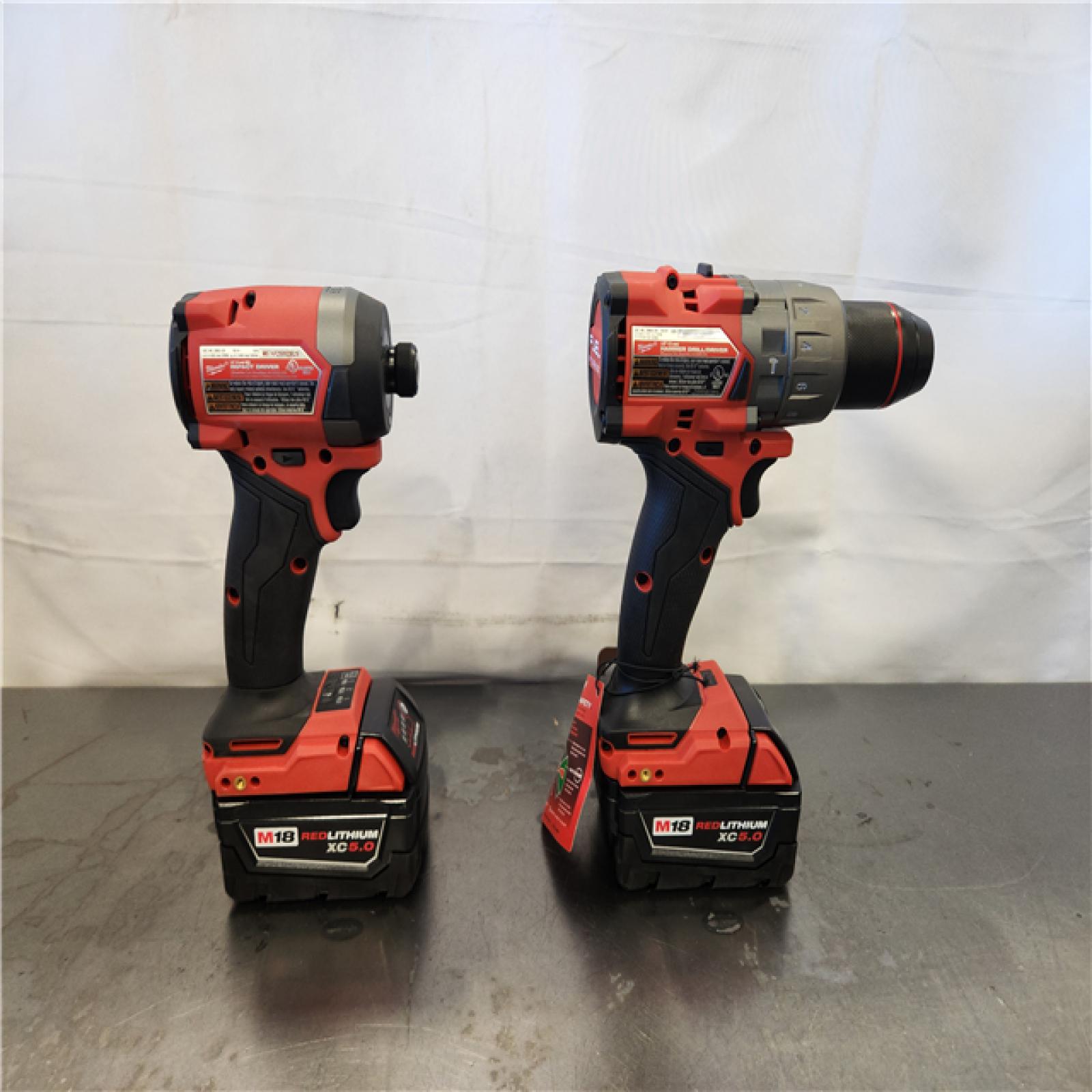 AS-IS- Milwaukee FUEL 18V Lithium-Ion Brushless Cordless Hammer Drill and Impact Driver Combo Kit