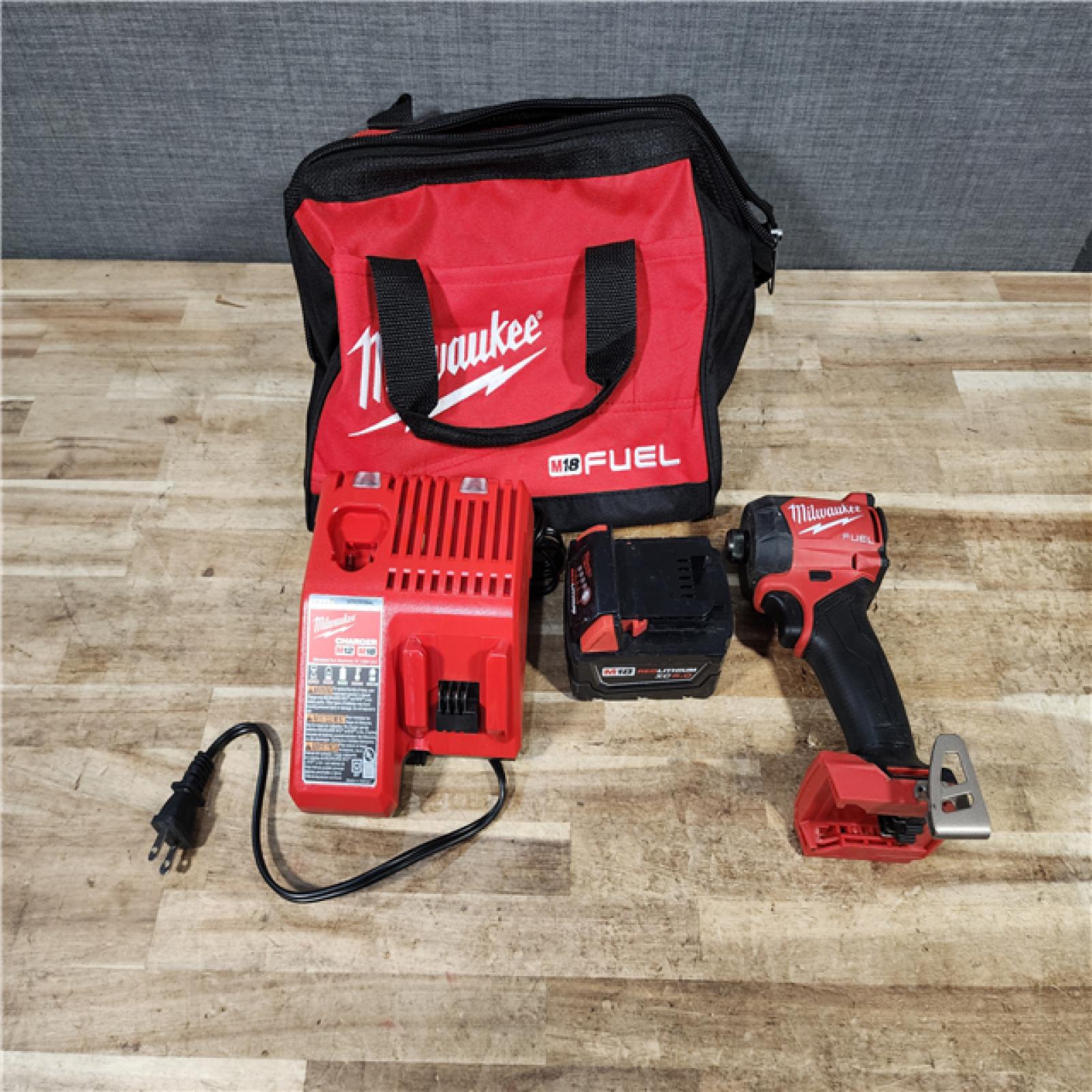 HOUSTON LOCATION - AS - IS Milwaukee FUEL SURGE 18V Lithium-Ion Brushless Cordless 1/4 in. Hex Impact Driver Kit