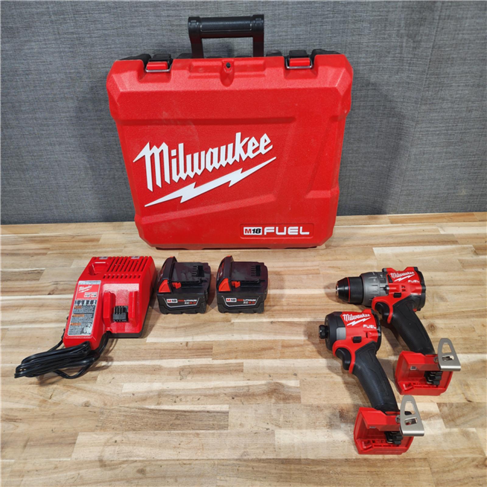 HOUSTON LOCATION - AS-IS (APPEARS LIKE NEW) Milwaukee  FUEL 18V Lithium-Ion Brushless Cordless Hammer Drill and Impact Driver Combo Kit