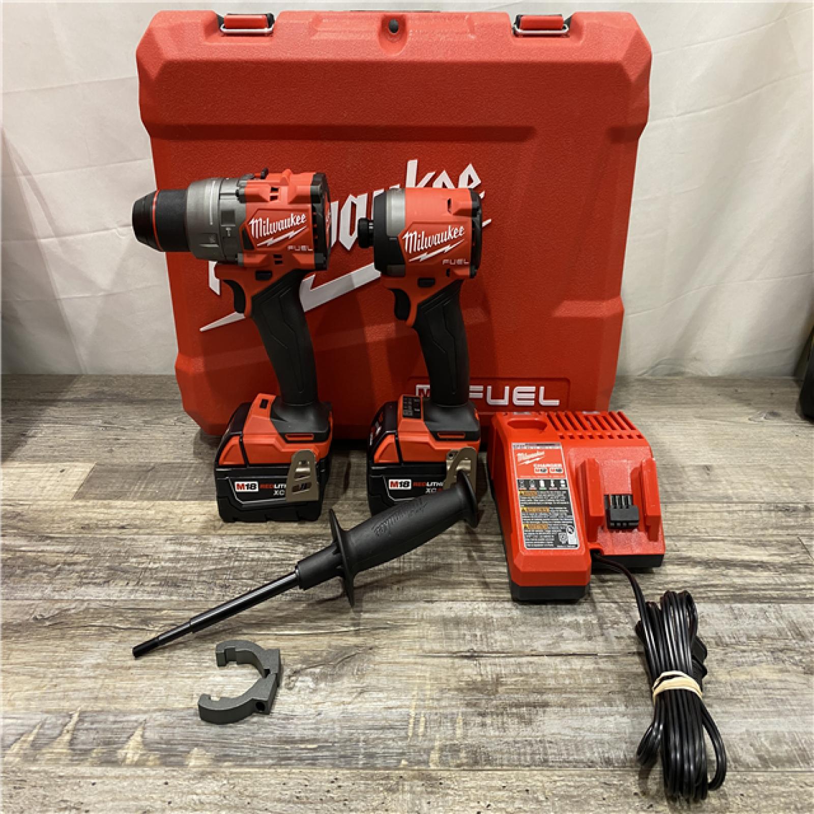 AS-IS Milwaukee FUEL 18V Lithium-Ion Brushless Cordless Hammer Drill and Impact Driver Combo Kit