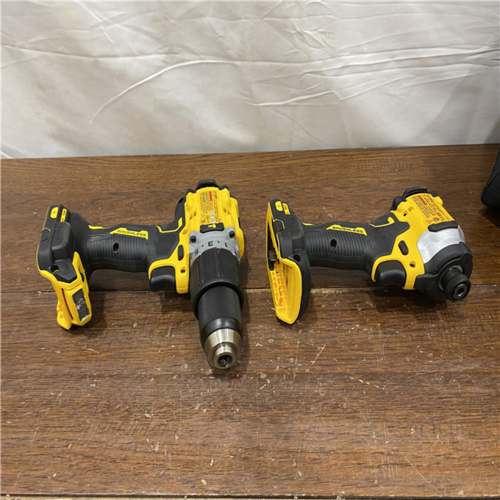AS-IS DEWALT 20V MAX XR Hammer Drill and ATOMIC Impact Driver 2 Tool Cordless Combo Kit with (2) 4.0Ah Batteries, Charger, and Bag