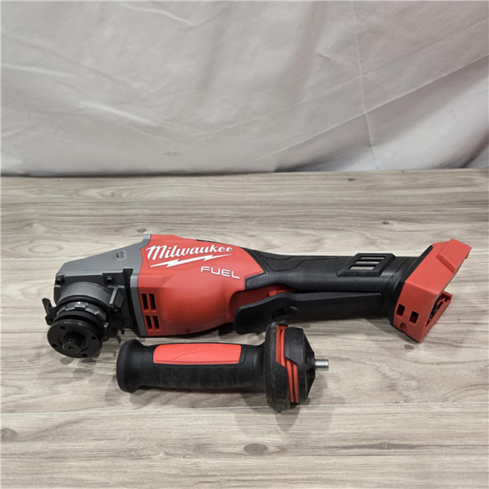 AS-IS Milwaukee M18 FUEL 4-1/2-6 Cordless Braking Grinder  Paddle Switch (Tool-Only)