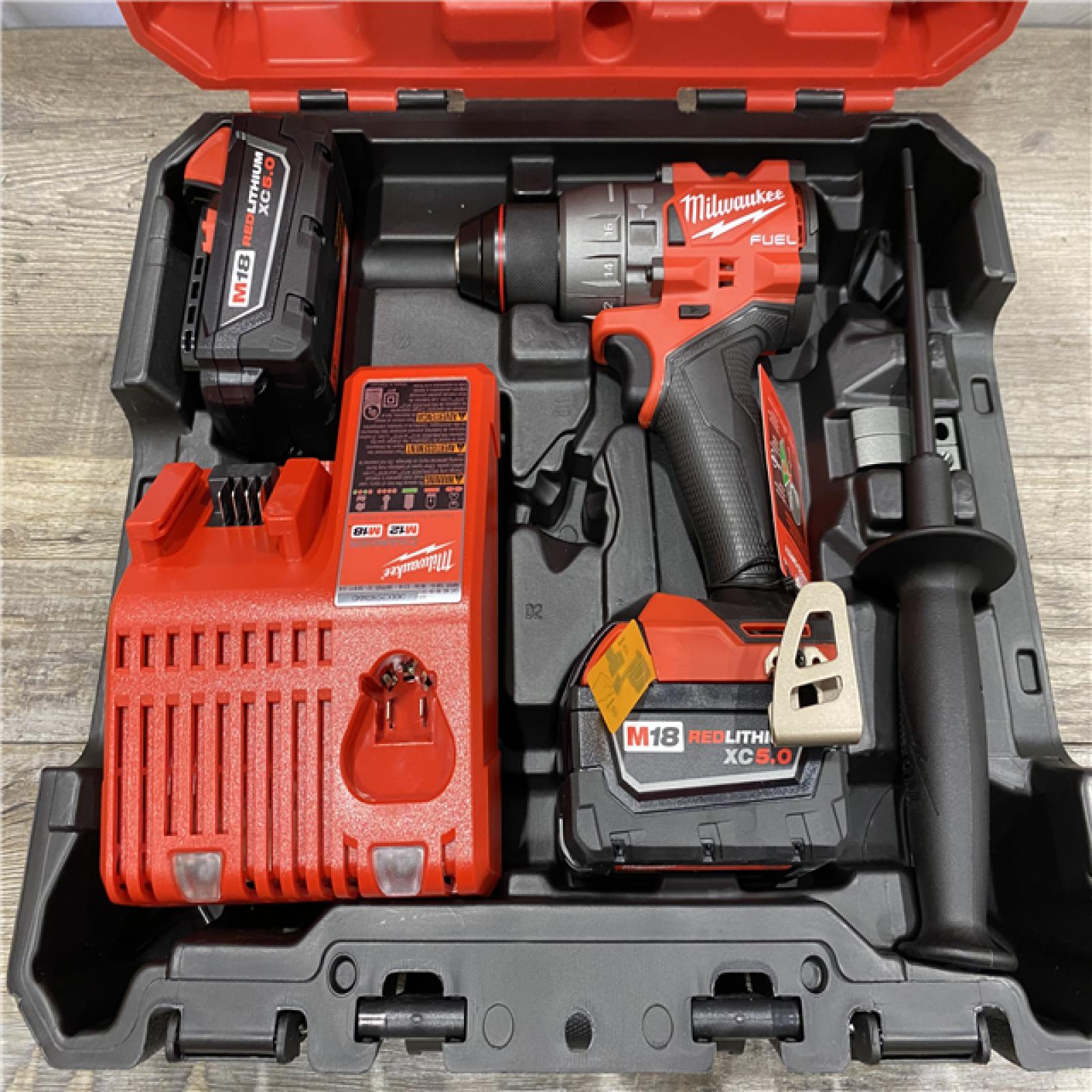 AS-IS Milwaukee FUEL 18V Lithium-Ion Brushless Cordless 1/2 in. Hammer Drill Driver Kit