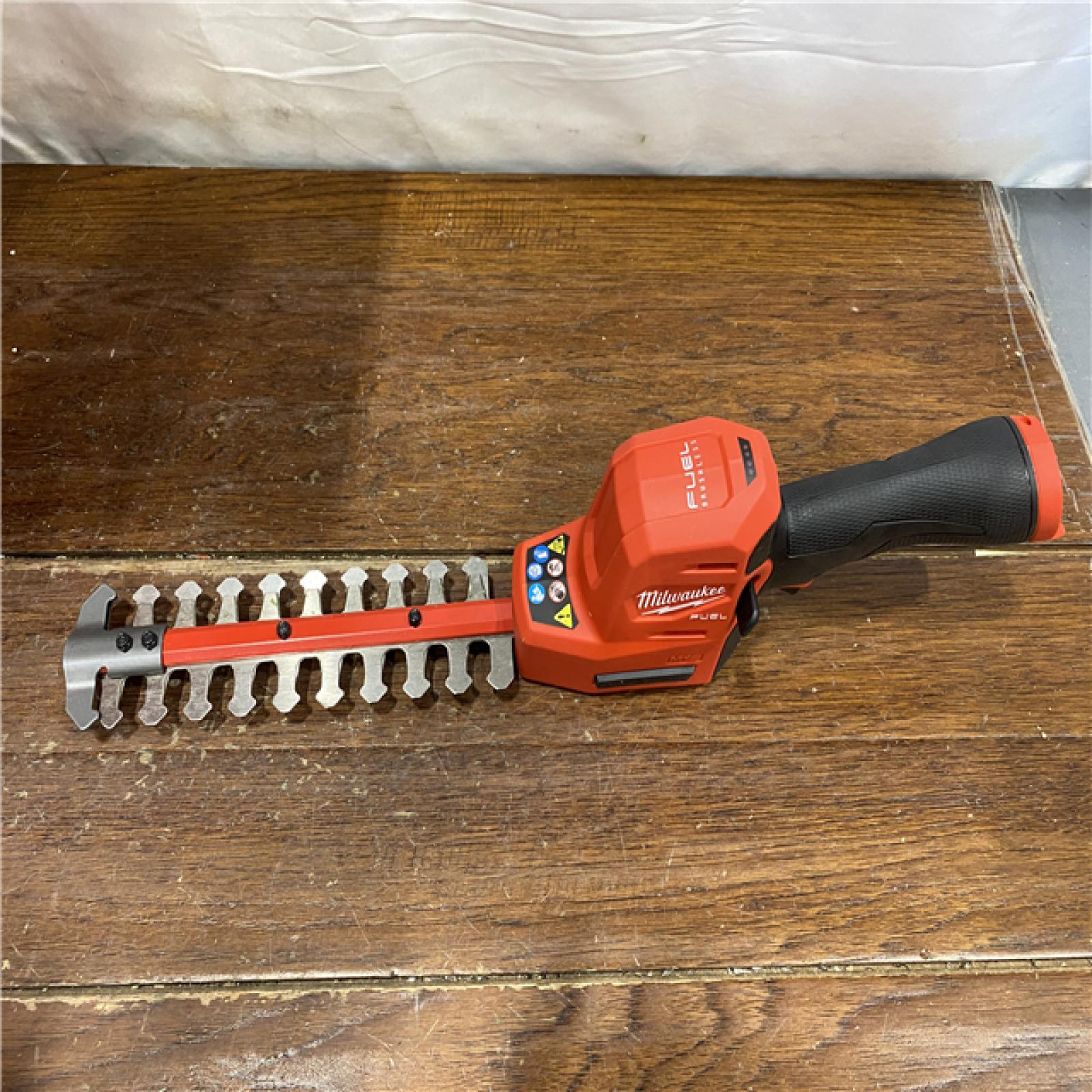 AS-IS Milwaukee M12 FUEL 8 in. 12V Lithium-Ion Brushless Cordless Battery Hedge Trimmer (Tool-Only)