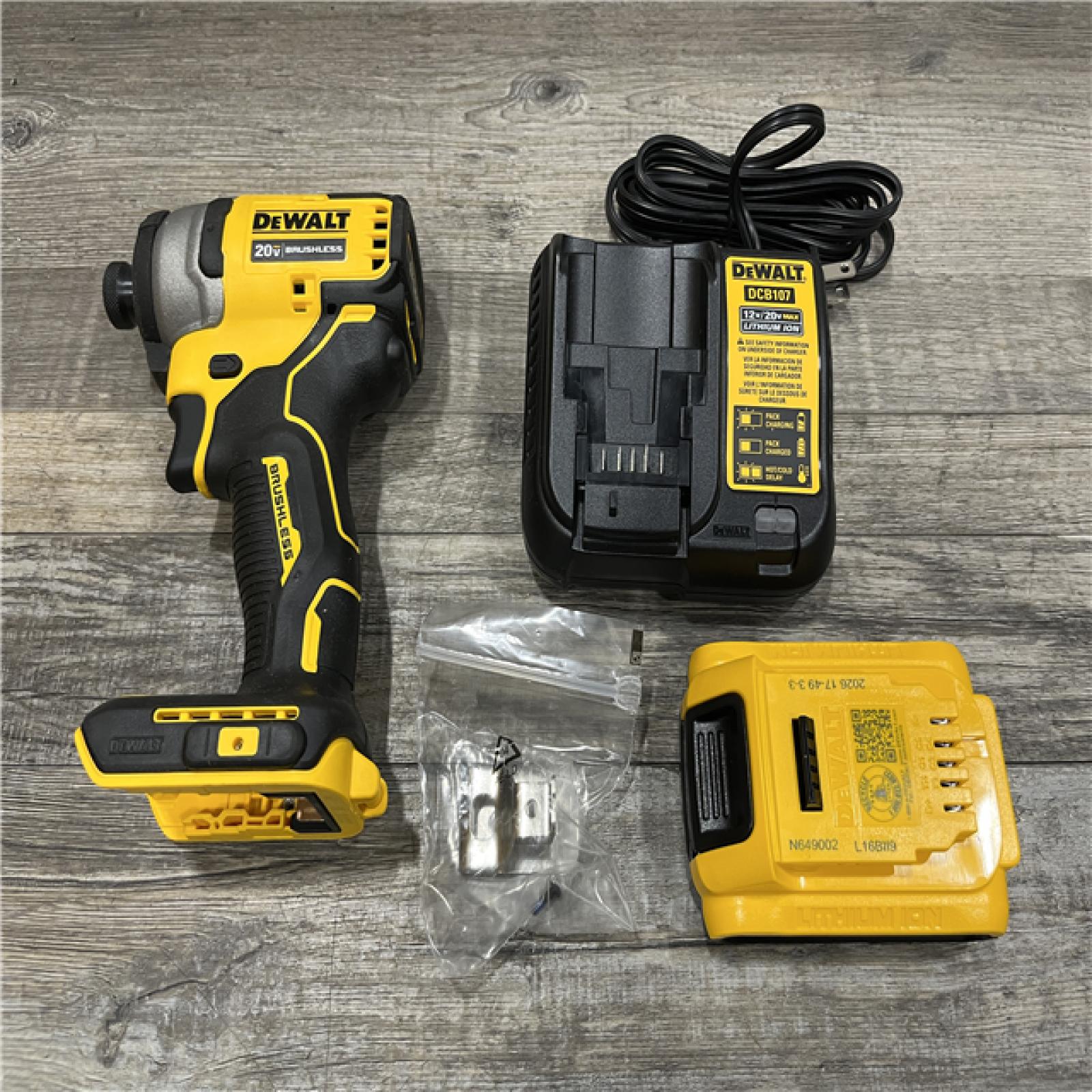 AS-IS DEWALT Atomic 20V Max Lithium-Ion Brushless Cordless Compact 1/4 in. Impact Driver Kit