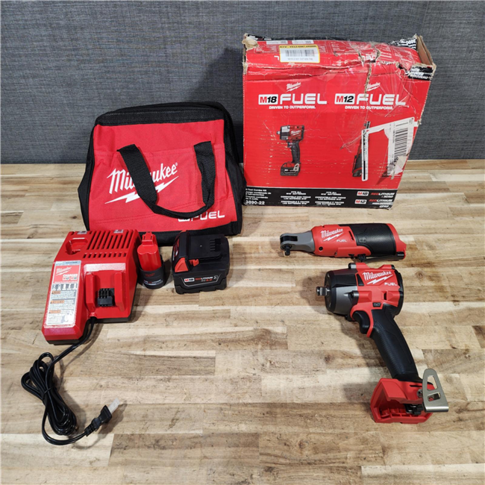 HOUSTON LOCATION - AS-IS Milwaukee FUEL 18V Cordless Mid Torque 1/2 in. Impact Wrench w/ M12 FUEL 3/8 in. Ratchet & Battery/Charger Combo Kit