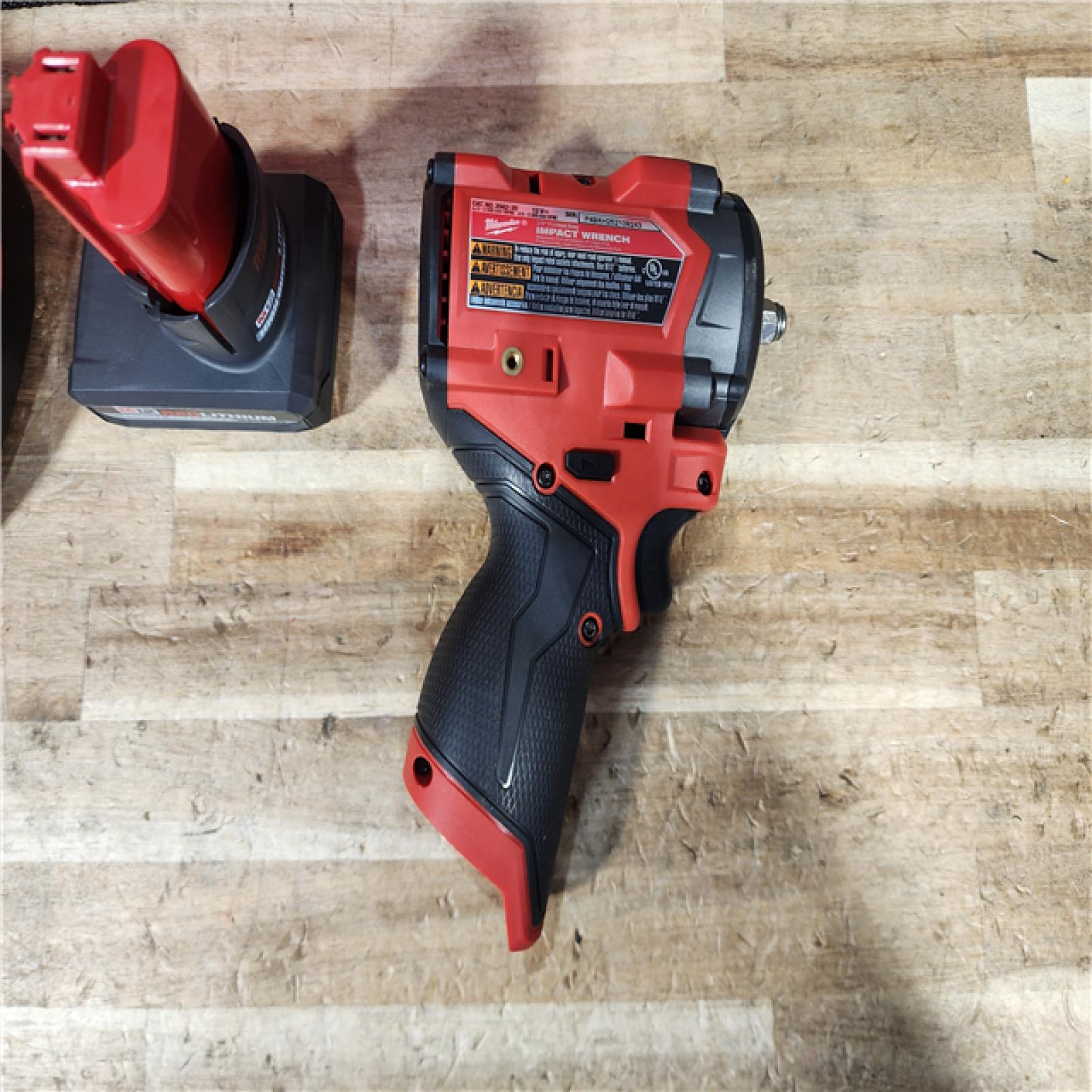 HOUSTON LOCATION - AS - IS Milwaukee FUEL 12V Li-Ion Brushless Cordless Stubby 3/8 in. Impact Wrench Kit