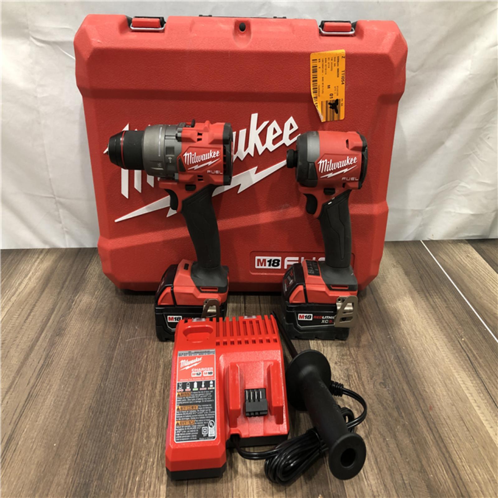 AS-IS Milwaukee FUEL 18V Lithium-Ion Brushless Cordless Hammer Drill and Impact Driver Combo Kit