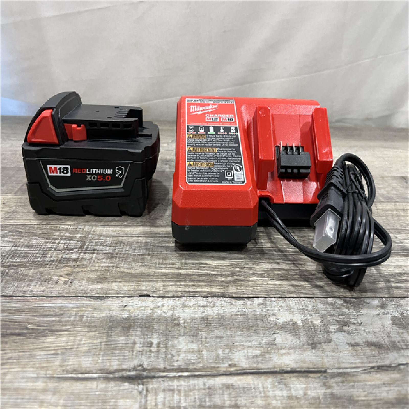 AS-IS Milwaukee 18-Volt Lithium-Ion XC Starter Kit with One 5.0Ah Battery and Charger