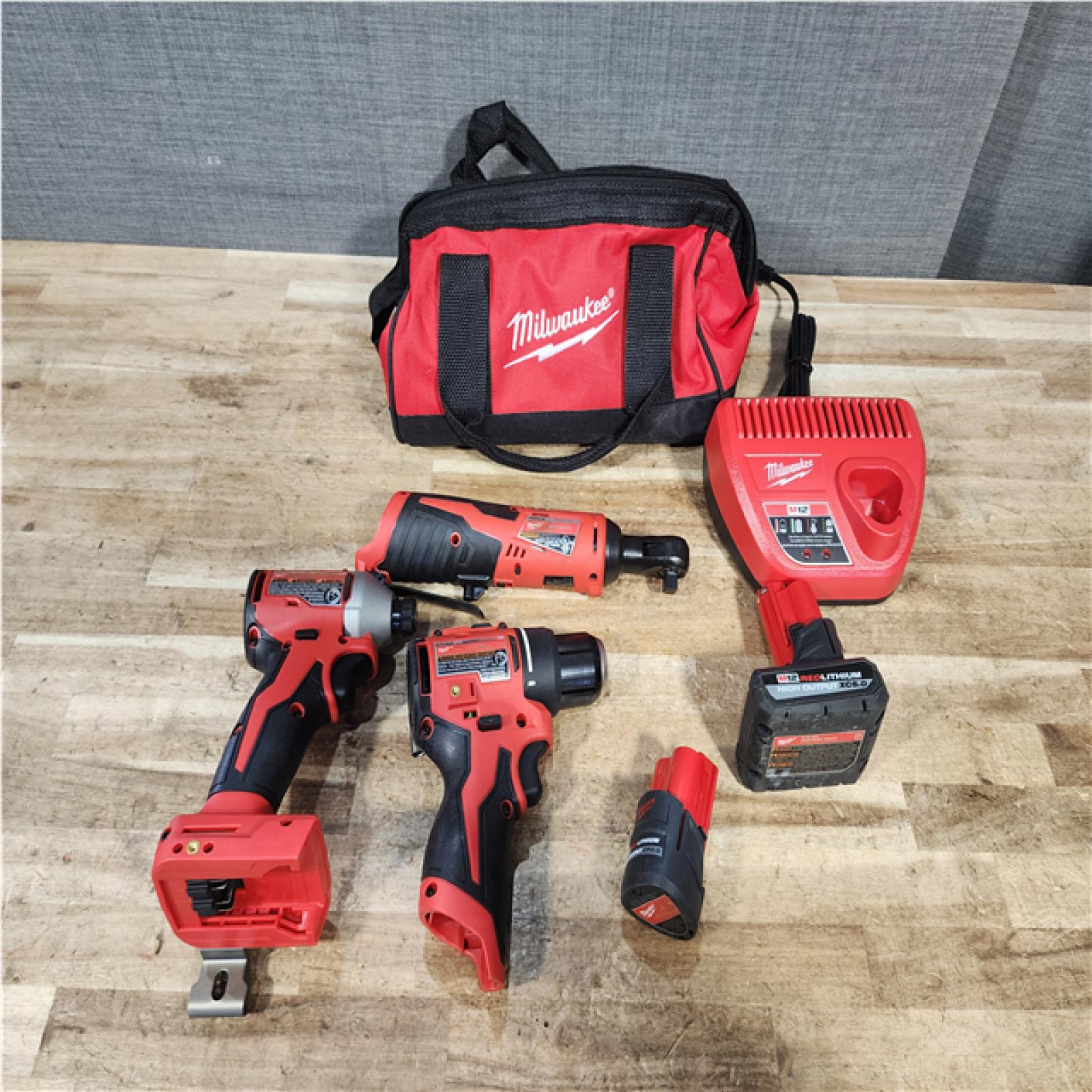 Houston Location AS-IS Milwaukee Drill and Impact and Rachet and Batteries QTY/2 and Charger