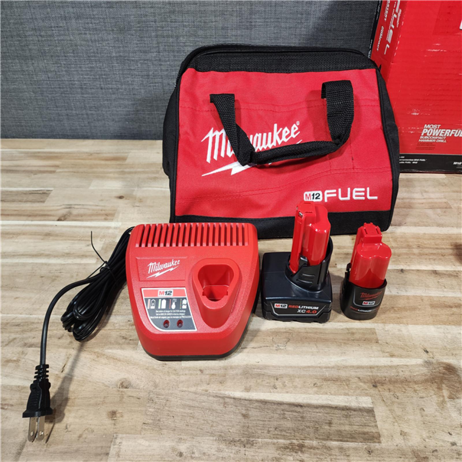 HOUSTON LOCATION - AS-IS Milwaukee  FUEL 12-Volt Lithium-Ion Brushless Cordless Hammer Drill and Impact Driver Combo Kit