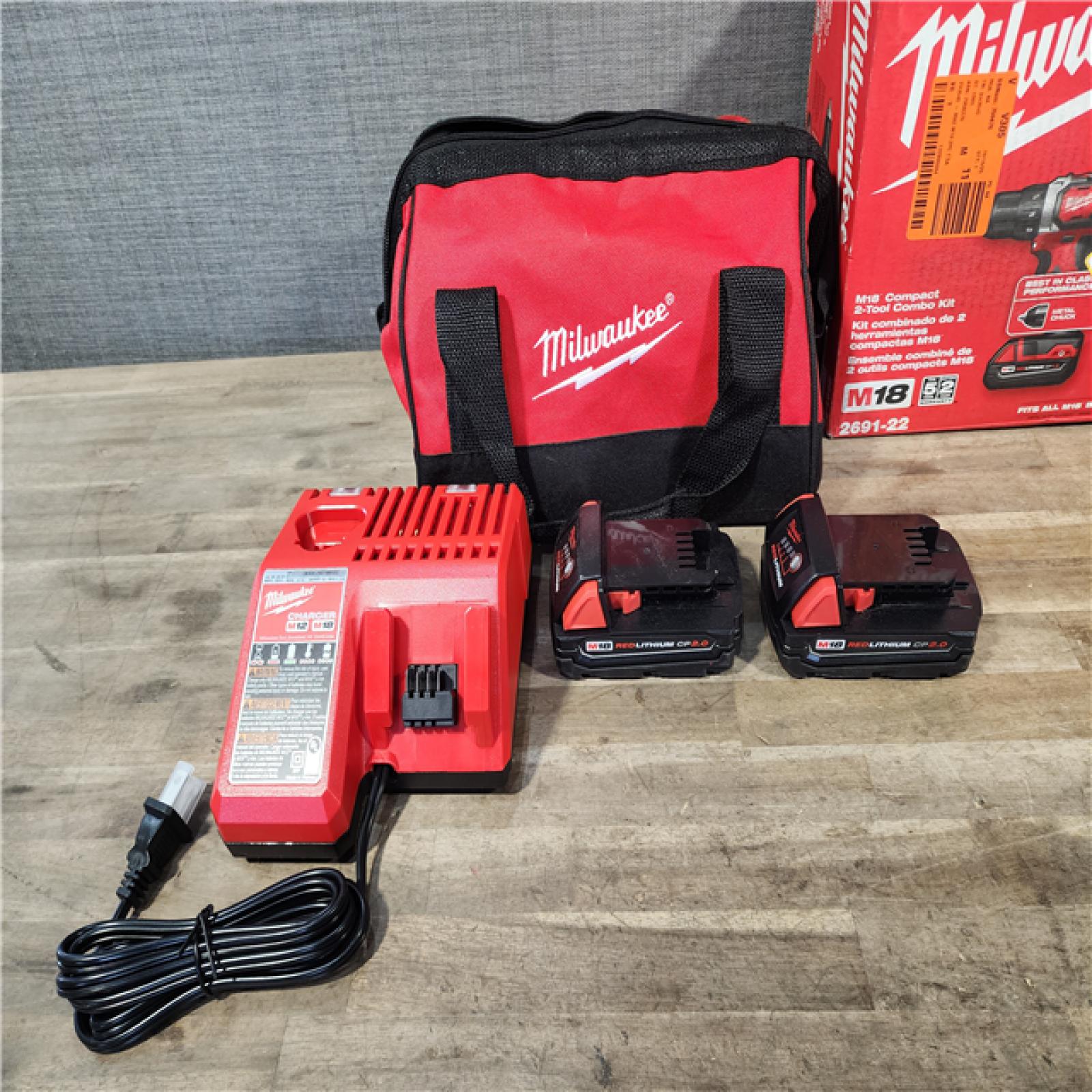 HOUSTON LOCATION - AS-IS Milwaukee 18V Cordless Brushed 2-Tool Drill/Driver and Impact Driver Kit