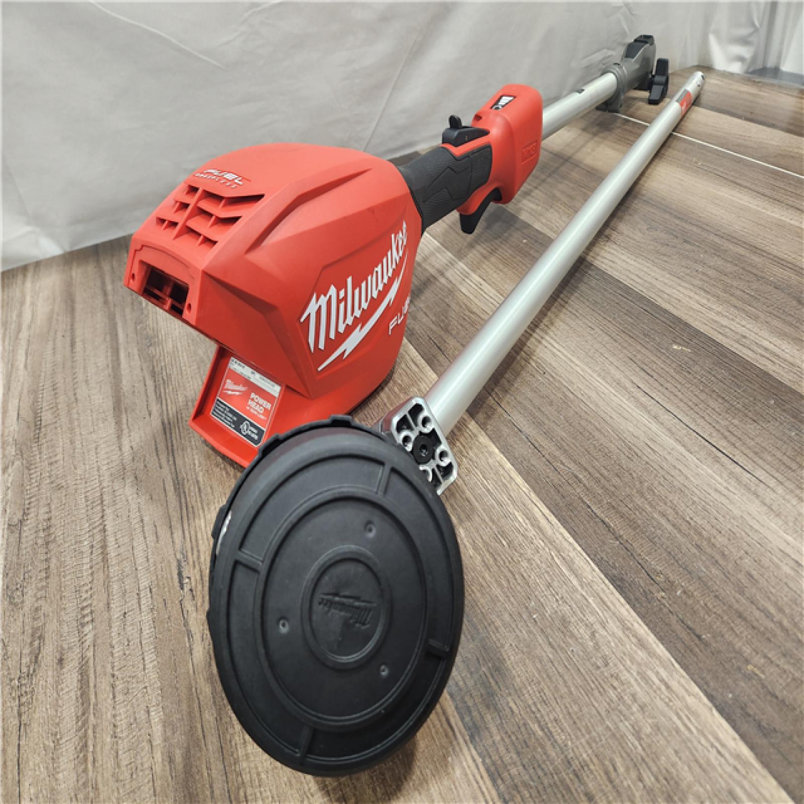 AS-IS- M18 FUEL 18V 16 in. Brushless Cordless Battery Powered String Trimmer W/QUIK-LOK Attachment Capability & 8.0 Ah Battery