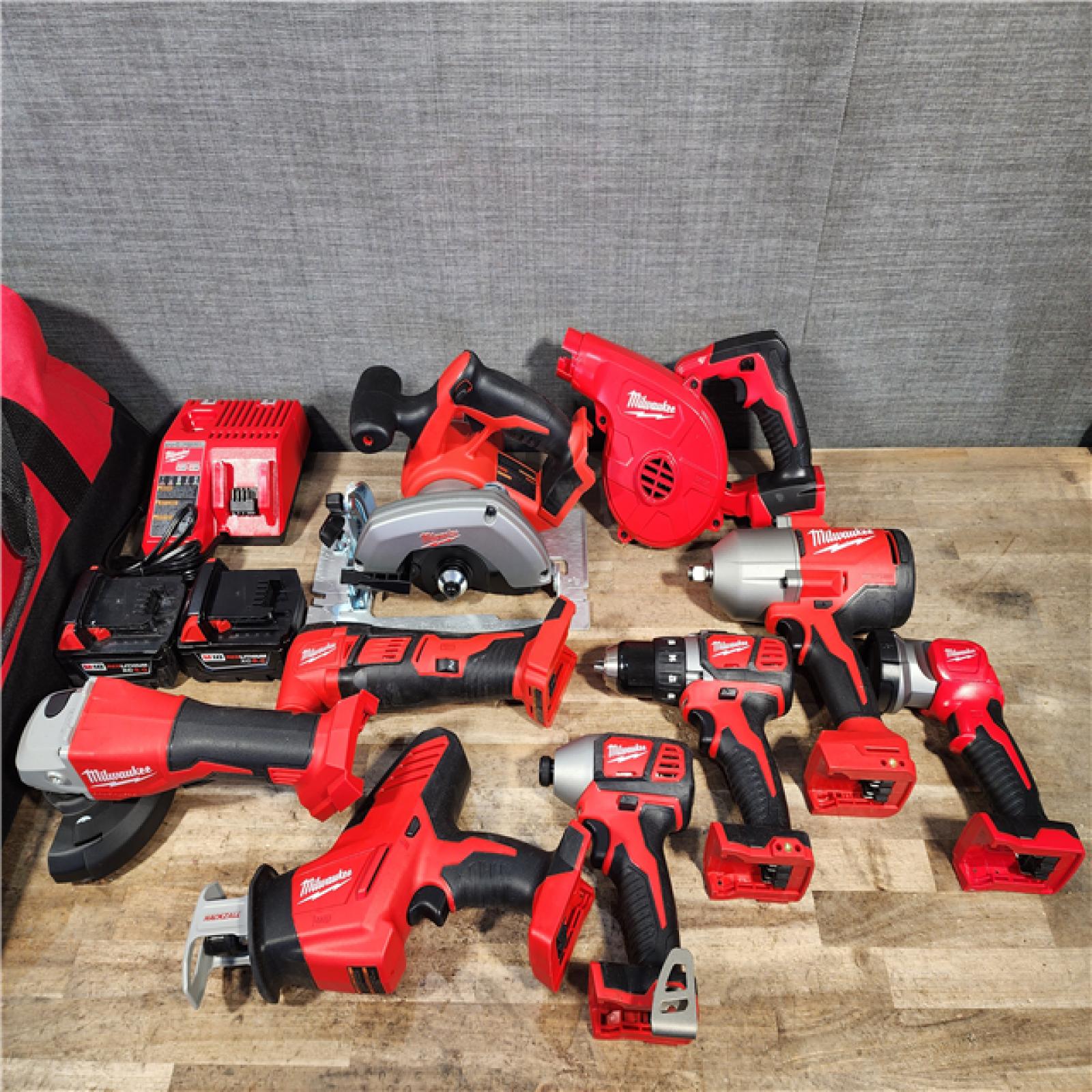 HOUSTON LOCATION - AS-IS Milwaukee M18 18-Volt Lithium-Ion Cordless Combo Kit (9-Tool) with (2) Batteries  Charger  and Tool Bag