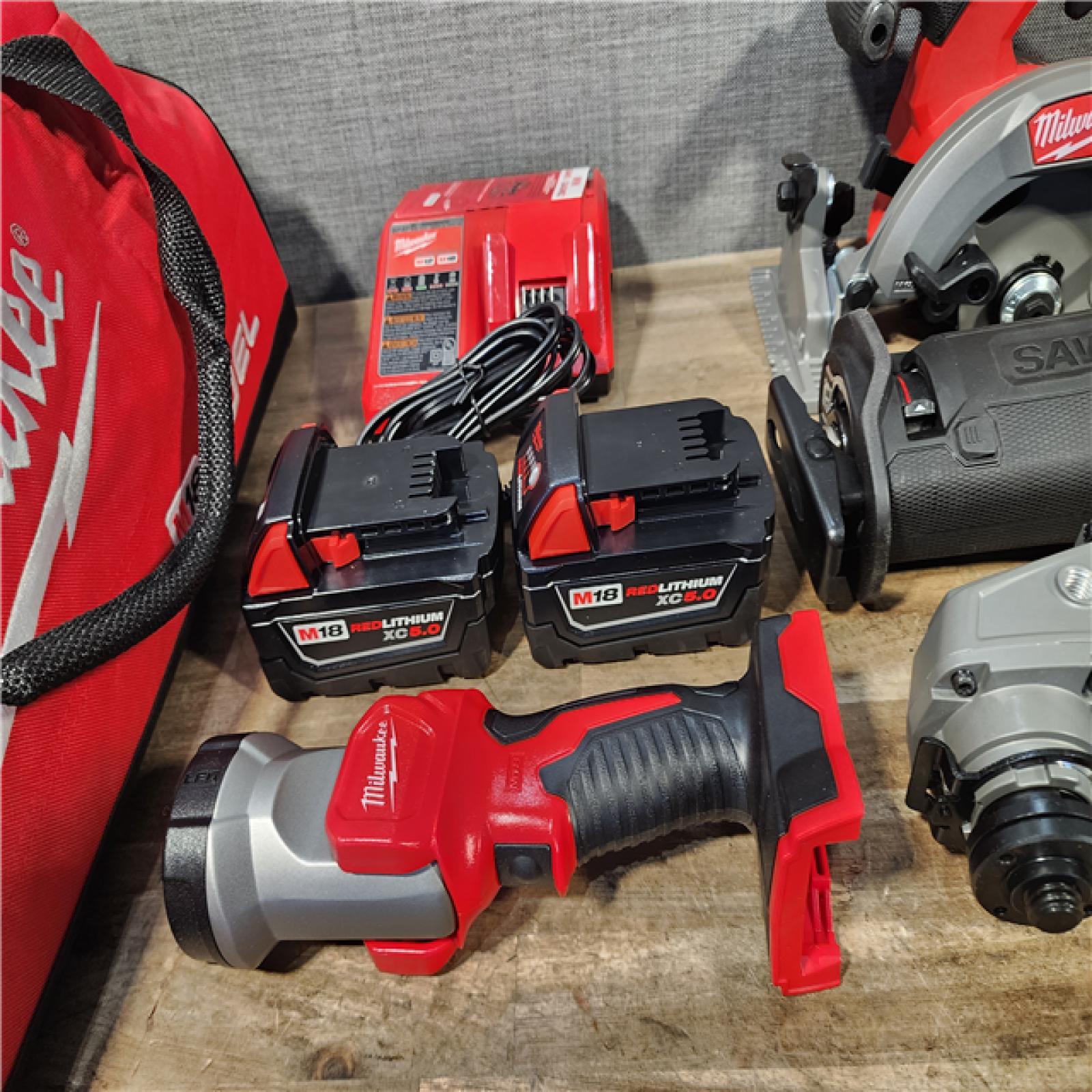 HOUSTON LOCATION - AS-IS MILWAUKEE FUEL 7 TOOL COMBO KIT W/ CHARGER & (2) BATTERY