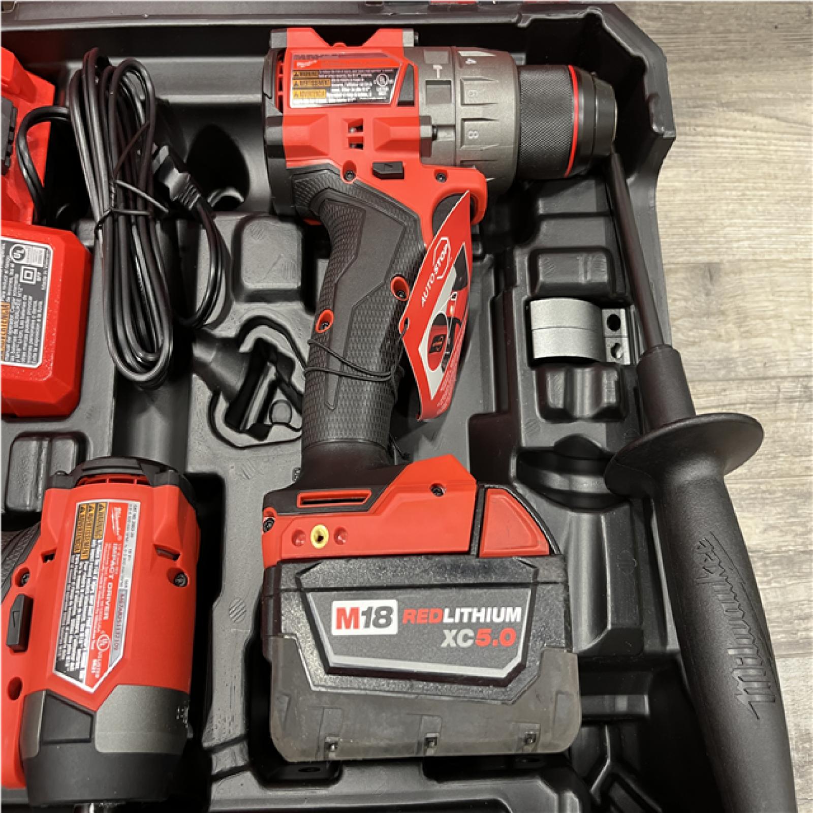 AS-IS Milwaukee FUEL 18V Lithium-Ion Brushless Cordless Hammer Drill and Impact Driver Combo Kit