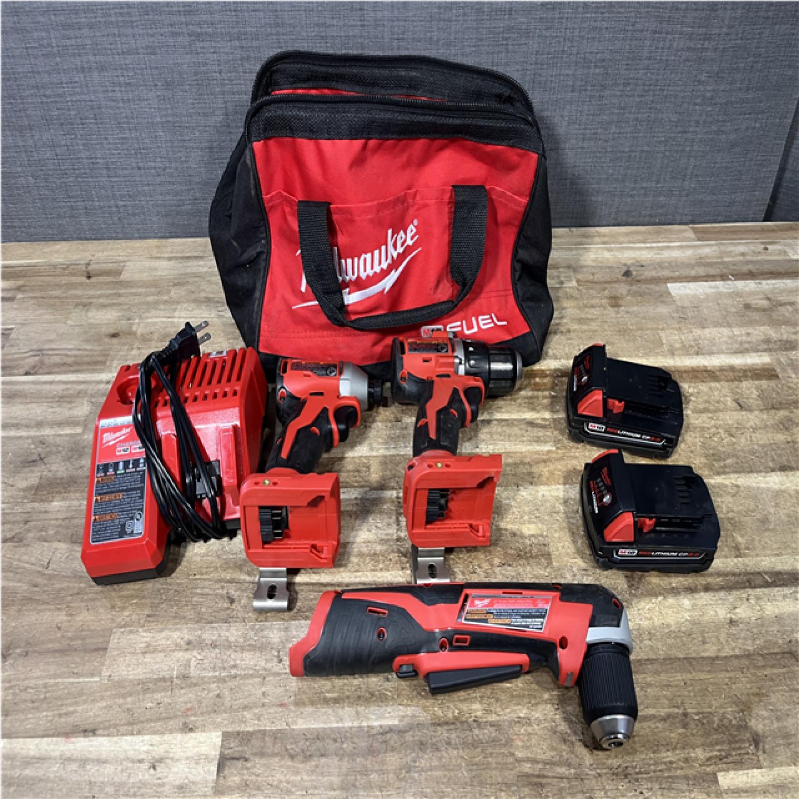 Houston Location AS-IS Milwaukee Drill Driver and Impact Driver and Right Angle Drill and Batteries QTY/2 and Charger