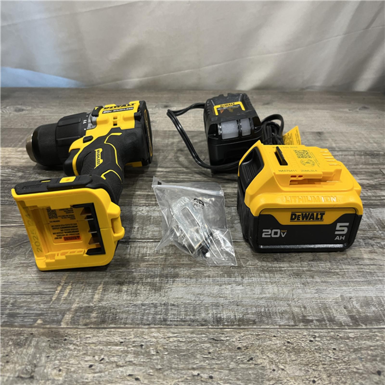 AS-IS DEWALT ATOMIC 20V Lithium-Ion Cordless 1/2 in. Hammer Drill Kit