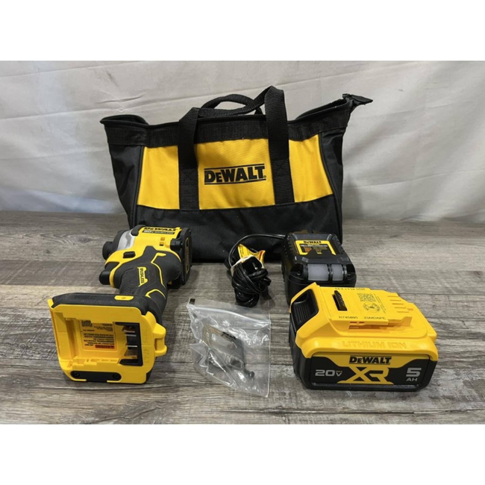 AS-IS DEWALT ATOMIC 20V MAX Lithium-Ion Cordless 1/4 in. Brushless Impact Driver Kit
