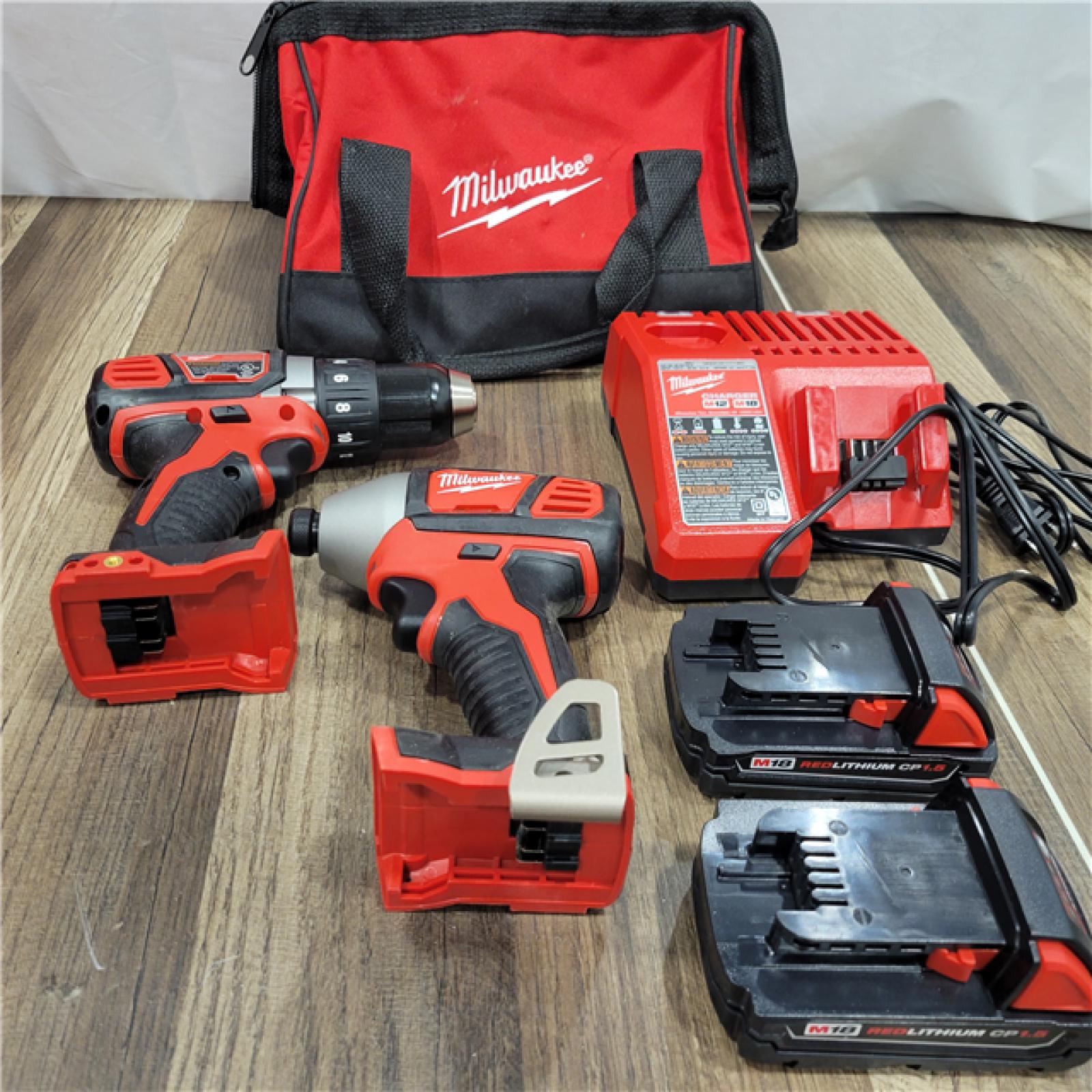 AS-IS Milwaukee M18 18V Cordless Brushed 2 Tool Drill/Driver and Impact Driver Kit