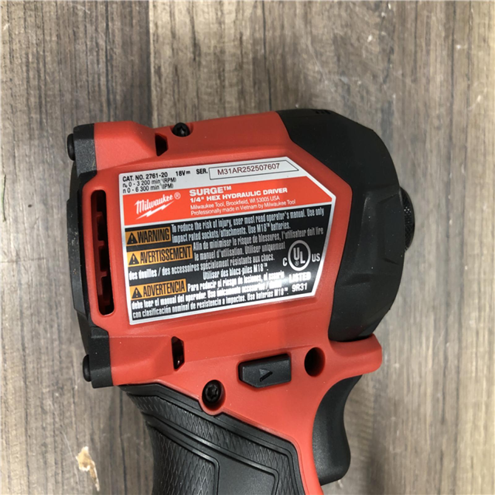 AS-IS Milwaukee FUEL SURGE 18V Lithium-Ion Brushless Cordless 1/4 in. Hex Impact Driver (Tool-Only)