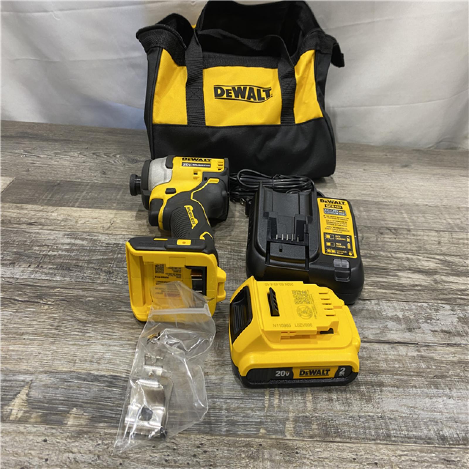 AS-IS DEWALT Atomic 20V Max Lithium-Ion Brushless Cordless Compact 1/4 in. Impact Driver Kit