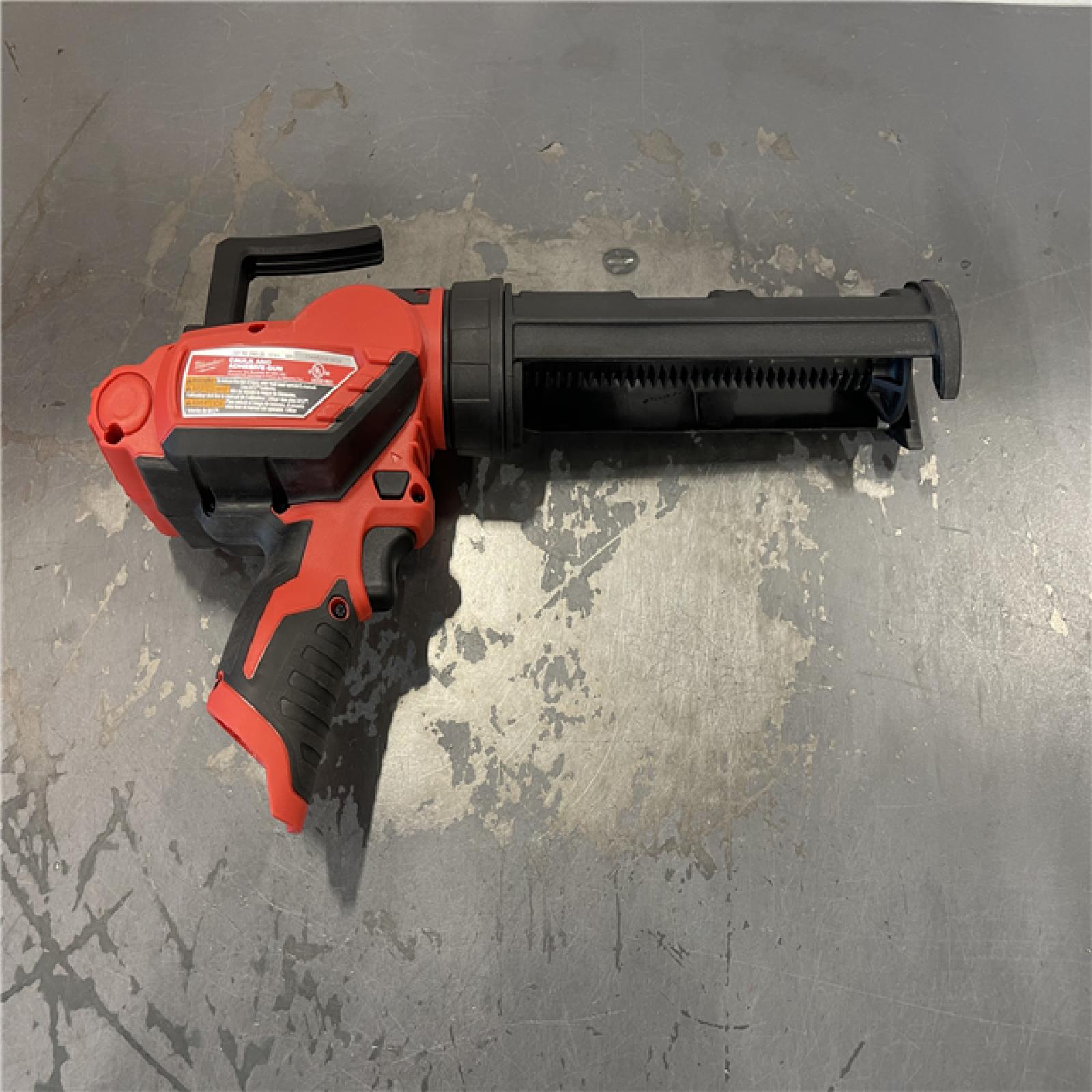 AS-IS- Milwaukee M12 12V Cordless 10oz Caulk/Adhesive Gun (Tool Only)