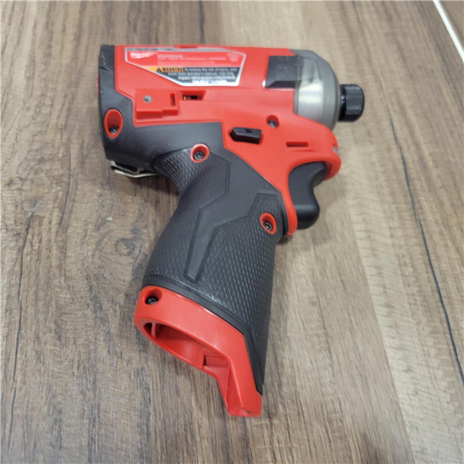 AS-IS M12 Milwaukee FUEL SURGE 12V Lithium-Ion Brushless Cordless 1/4 in. Hex Impact Driver Compact Kit W/Two 2.0Ah Batteries, Bag