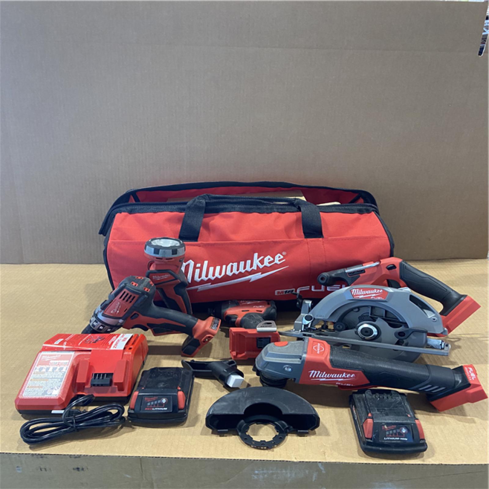 AS-IS MILWAUKEE M18 18-Volt Lithium-Ion Brushless Cordless FUEL Combo Kit (5-Tool) with 2-Batteries  1-Charger  and Tool Bag
