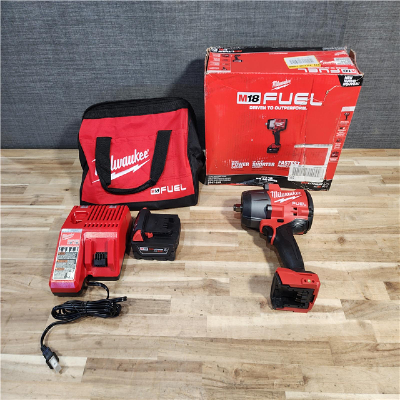 HOUSTON LOCATION - AS-IS (APPEARS LIKE NEW) Milwaukee FUEL 18V Lithium-Ion Brushless Cordless 1/2 in. Impact Wrench w/Friction Ring Kit
