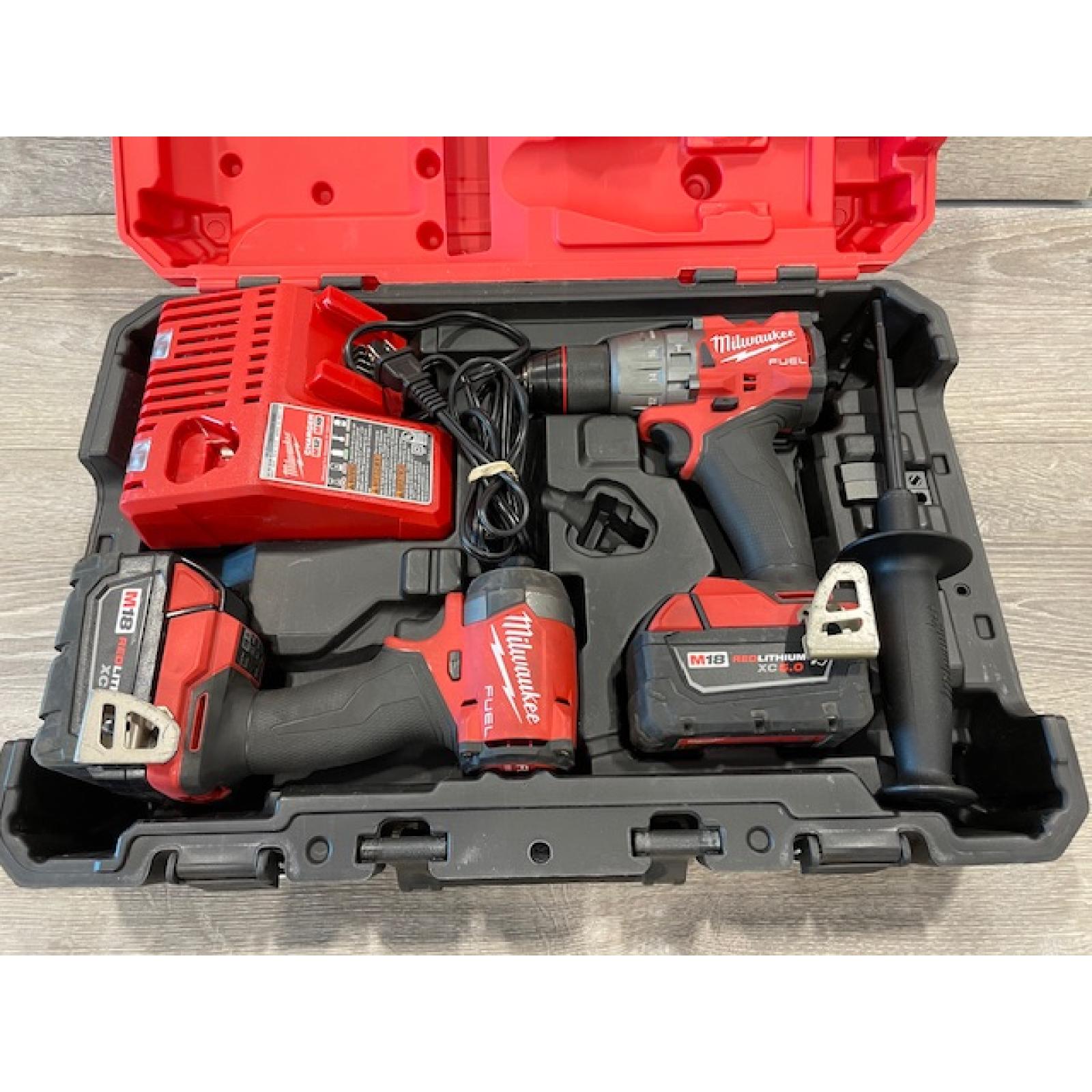 AS-IS Milwaukee FUEL 18V Lithium-Ion Brushless Cordless Hammer Drill and Impact Driver Combo Kit