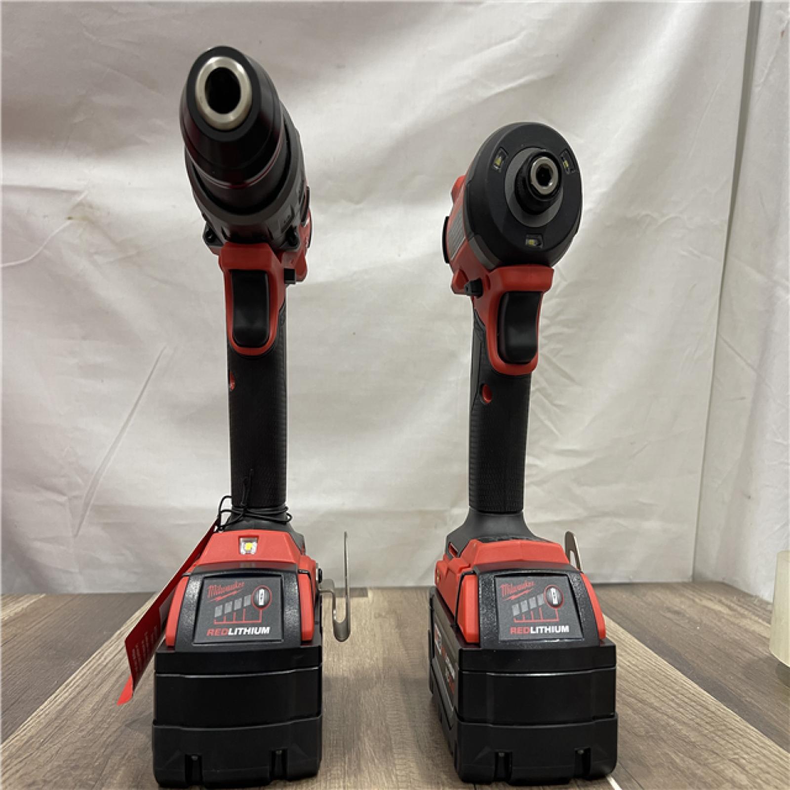 AS-IS Milwaukee FUEL 18V Lithium-Ion Brushless Cordless Hammer Drill and Impact Driver Combo Kit