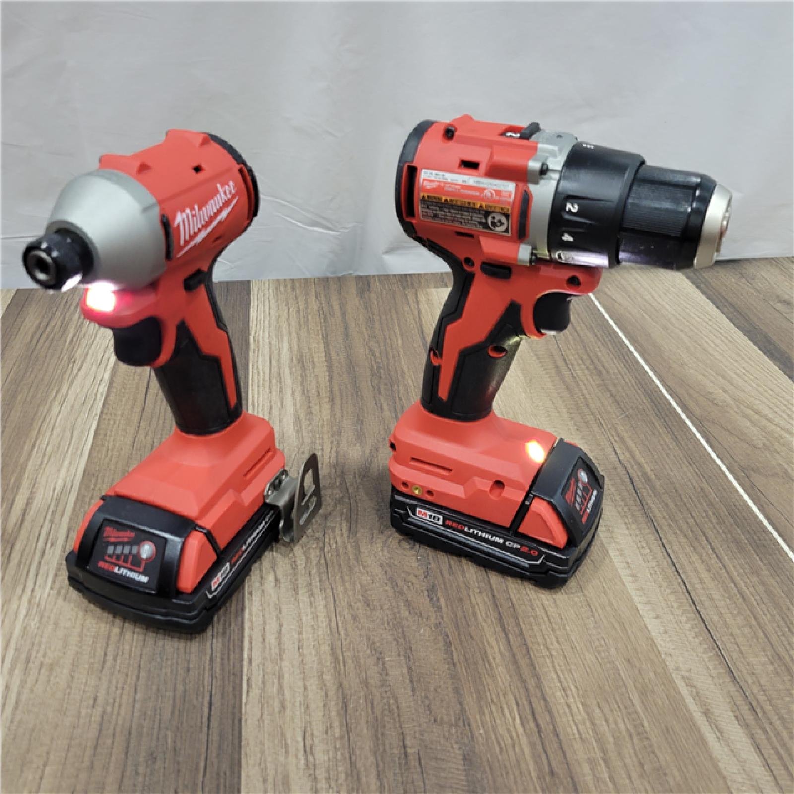 AS-IS Milwaukee M18 18V Lithium-Ion Brushless Cordless Compact Drill/Impact Combo Kit (2-Tool) W/(2) 2.0 Ah Batteries, Charger & Bag