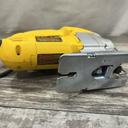AS-IS DEWALT 5.5 Amp Corded Variable Speed Jig Saw With Bag