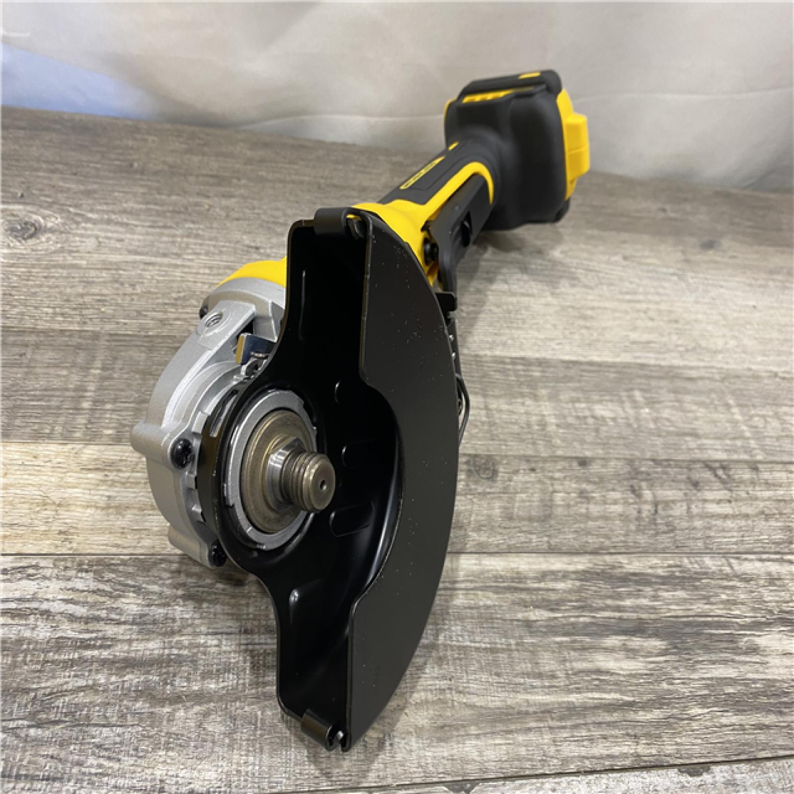 AS-IS DEWALT 20V MAX Cordless Brushless 4-1/2 in. Angle Grinder with Paddle Switch (Tool Only)