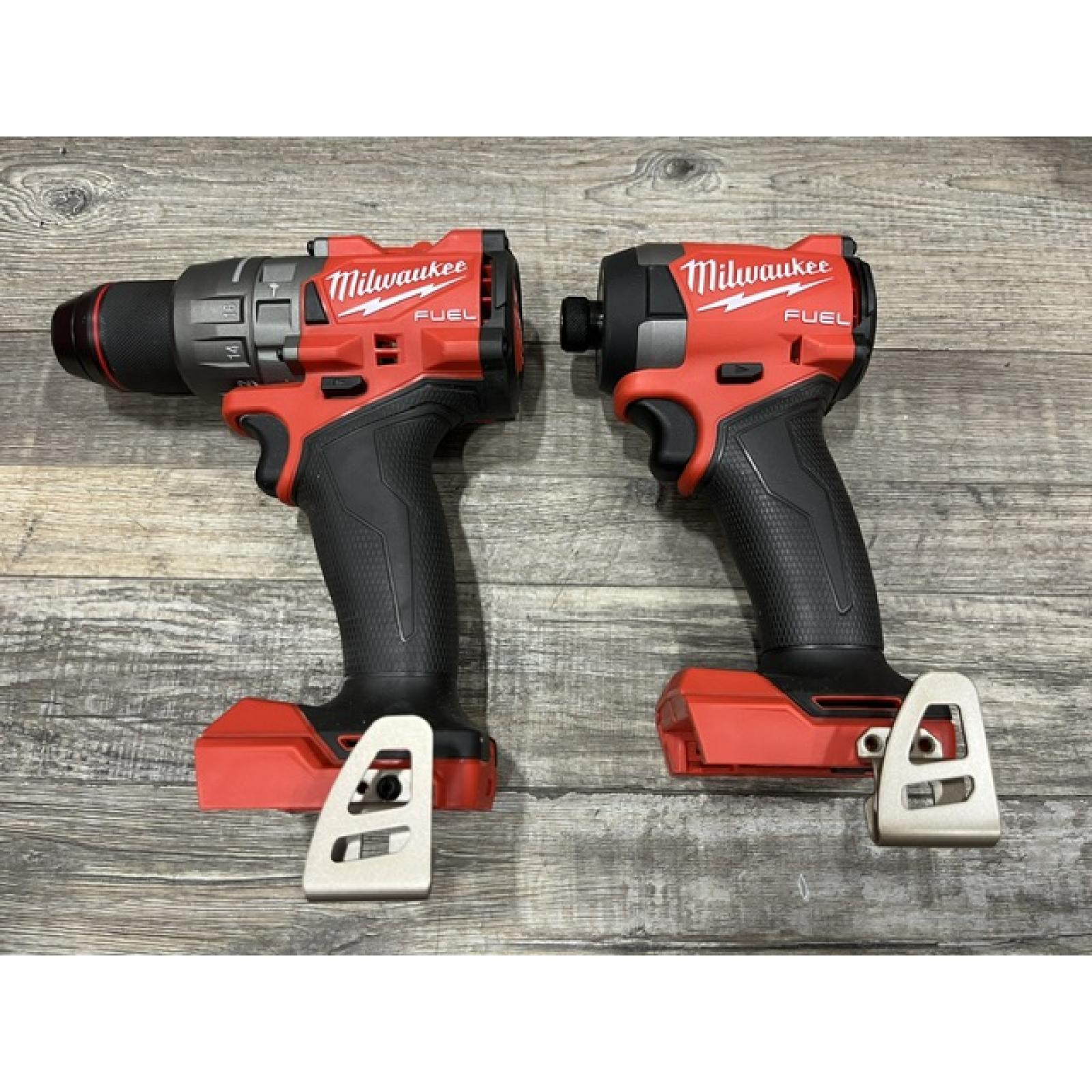 AS-IS Milwaukee FUEL 18V Lithium-Ion Brushless Cordless Hammer Drill and Impact Driver Combo Kit