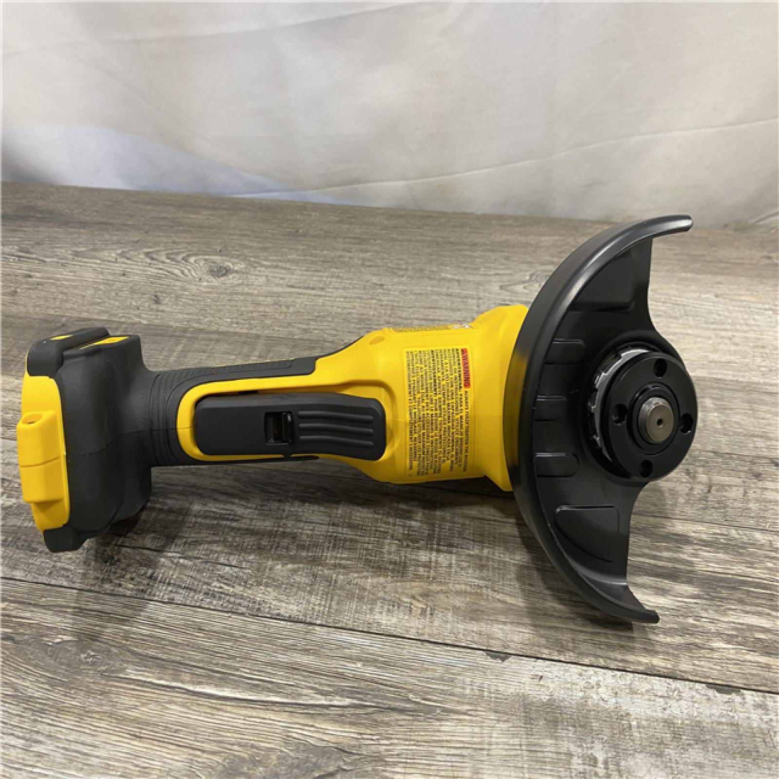 AS-IS DEWALT 20V MAX Cordless Brushless 4-1/2 in. Angle Grinder with Paddle Switch (Tool Only)