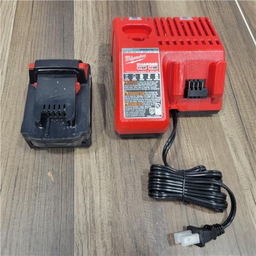 AS-IS Milwaukee M18 18-Volt Lithium-Ion XC Starter Kit with (1) 5.0Ah Battery and Charger