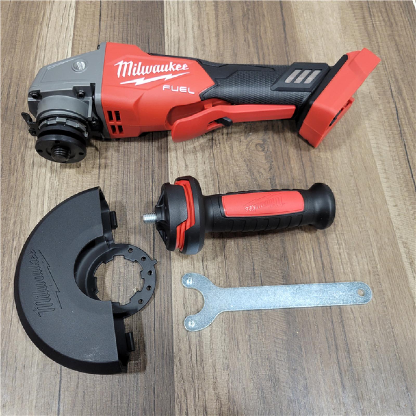 AS-IS Milwaukee 2880-20 M18 FUEL 18-Volt Lithium-Ion Brushless Cordless 4-1/2 in./5 in. Grinder W/Paddle Switch (Tool-Only)