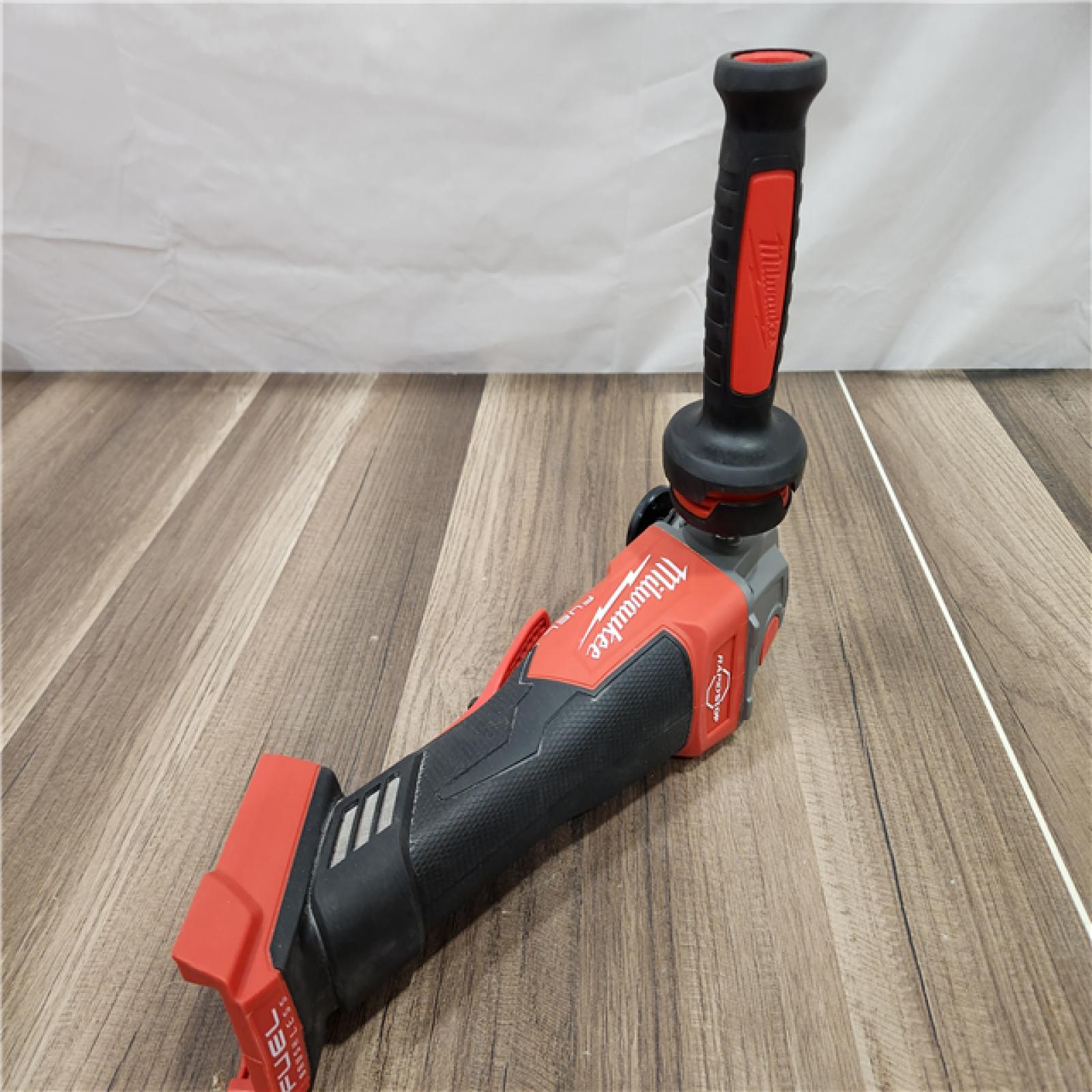 AS-IS Milwaukee 2880-20 FUEL 18-Volt Lithium-Ion Brushless Cordless 4-1/2 in./5 in. Grinder W/Paddle Switch (Tool-Only)