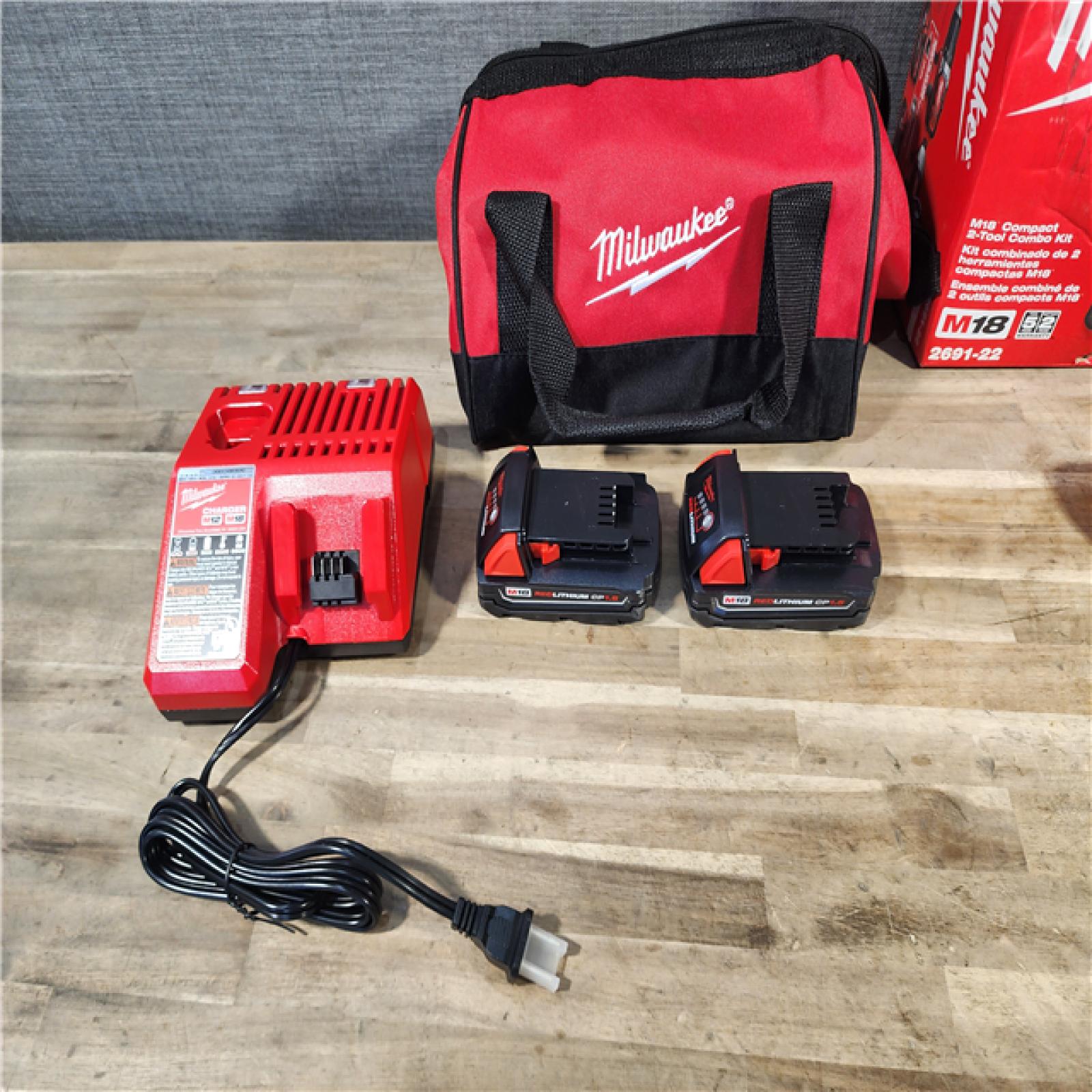HOUSTON LOCATION - AS-IS Milwaukee 18V Cordless Brushed 2-Tool Drill/Driver and Impact Driver Kit