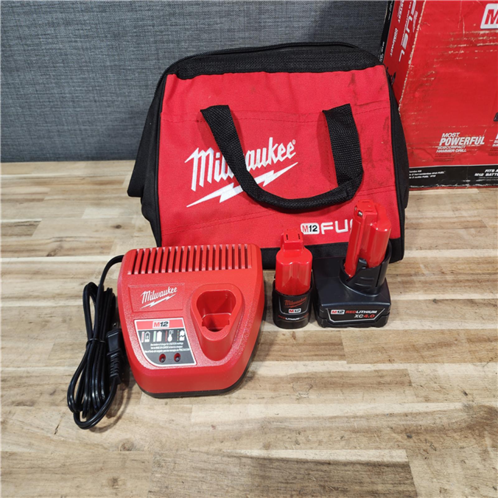 HOUSTON LOCATION - AS-IS Milwaukee  FUEL 12-Volt Lithium-Ion Brushless Cordless Hammer Drill and Impact Driver Combo Kit